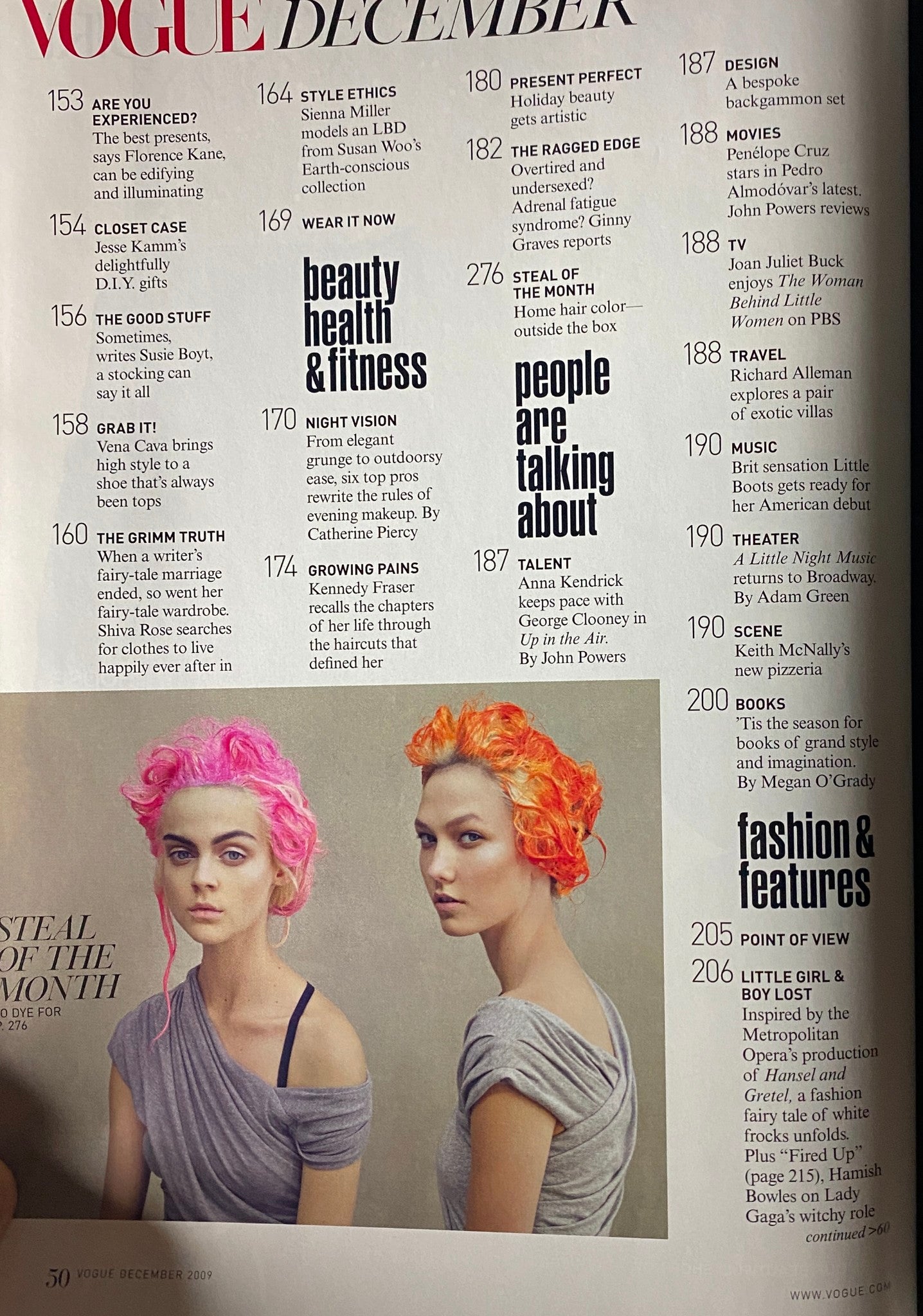 Another interior page from Vogue Magazine December 2009, showing a fashion feature with models displaying vibrant hairstyles, highlighting beauty and fashion trends of the season.