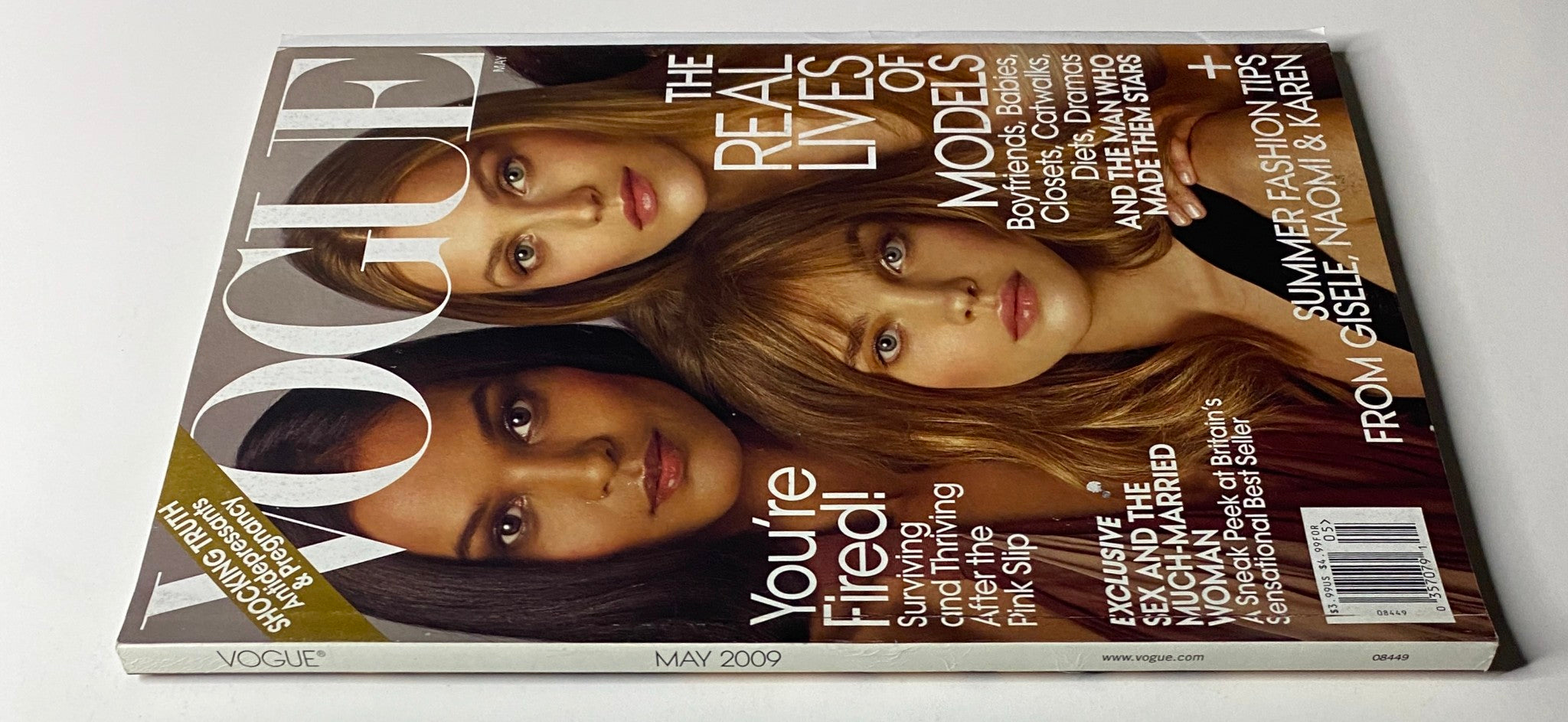Vogue Magazine May 2009 cover showing the striking faces of Liya Kebede, Isabeli Fontana, and Jourdan Dunn, emphasizing topics on modeling, fashion, and personal stories.