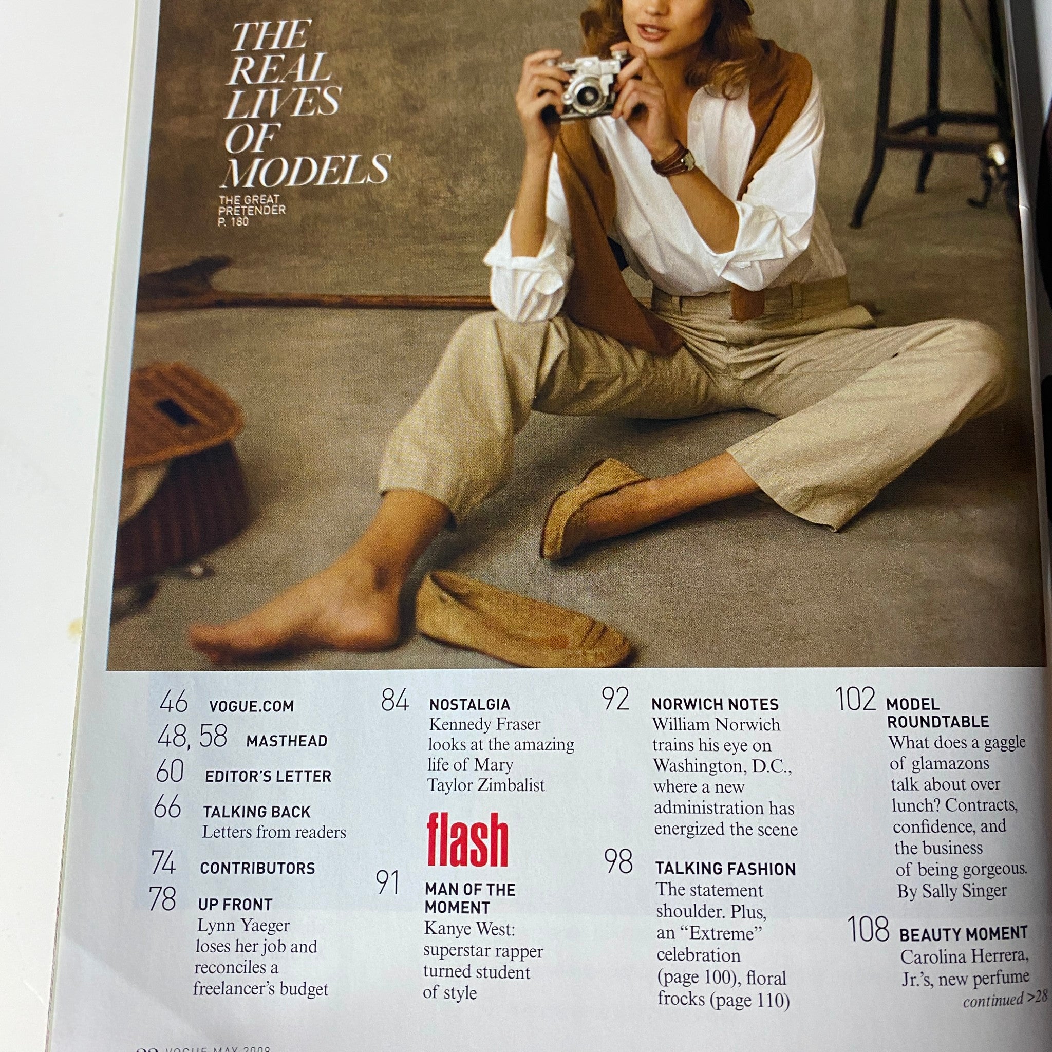 Inside Vogue Magazine May 2009 featuring articles, including The Real Lives of Models, Editor's Letter, and Contributions. Cover showcase with Liya Kebede, Isabeli Fontana, and Jourdan Dunn.