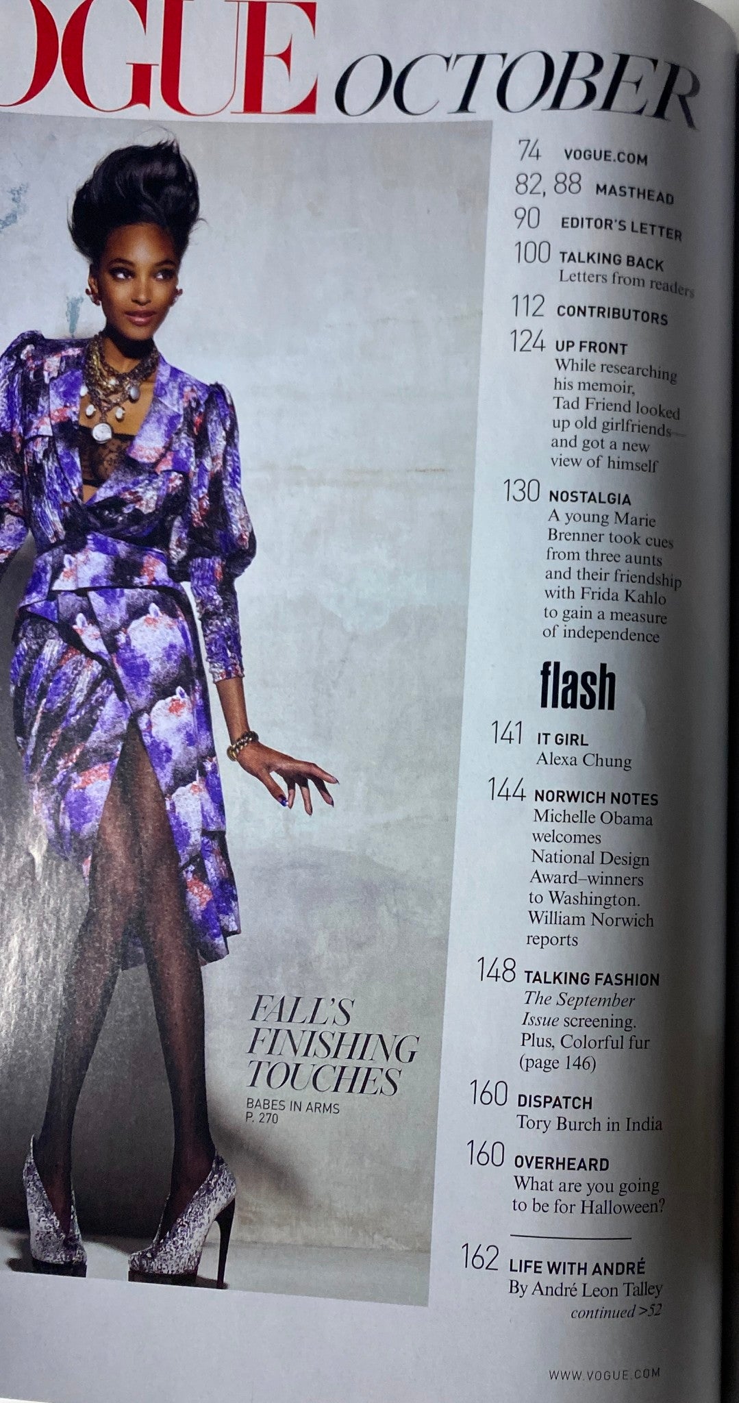 Vogue Magazine October 2009 Michelle Williams Cover, featuring a model in a vibrant purple dress with elegant accessories, showcasing fall fashion highlights.