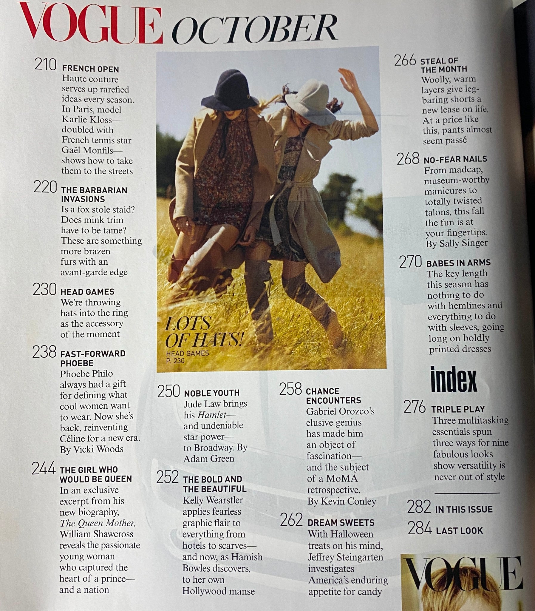 Vogue Magazine October 2009 page spreading fashion trends, featuring dynamic photography of models in outdoor settings, emphasizing autumn styles and accessories.