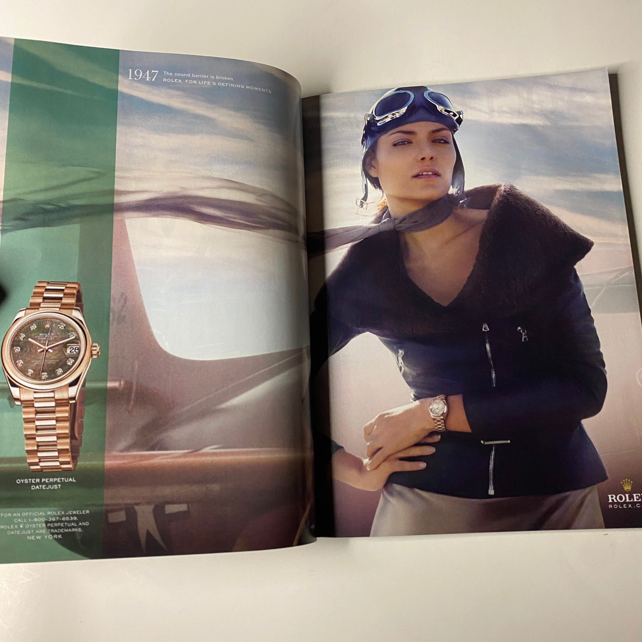 Vogue Magazine October 2009 showcasing a luxurious wristwatch and an elegant model in a stylish outfit, presenting travel-inspired fashion.