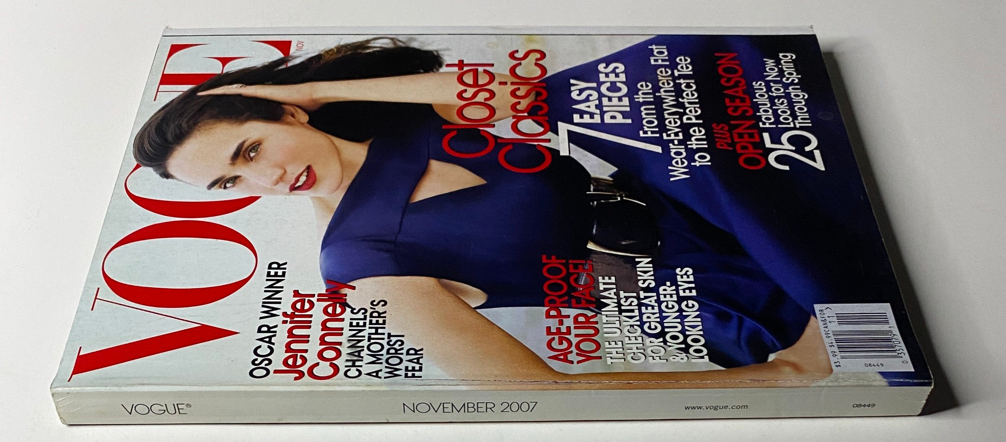 Side view of Vogue Magazine November 2007 with Jennifer Connelly on the cover, showcasing a focus on closet classics and fashion tips.
