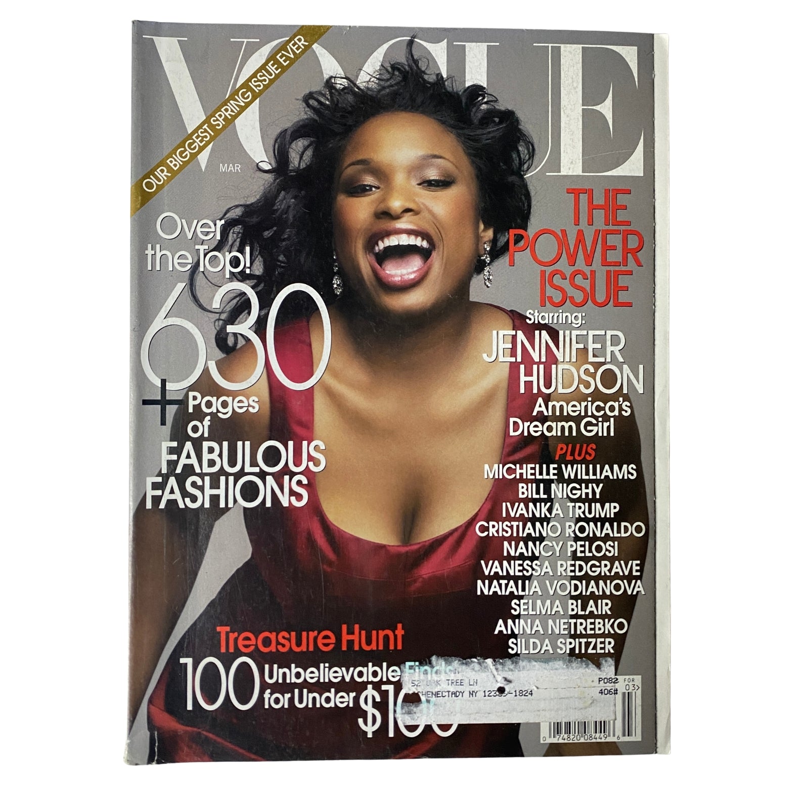 Vogue Magazine March 2007 Jennifer Hudson Cover featuring a joyful Jennifer Hudson wearing a stunning red dress, celebrating her success during the 'Dreamgirls' era, and emphasizing the magazine's theme of empowerment.