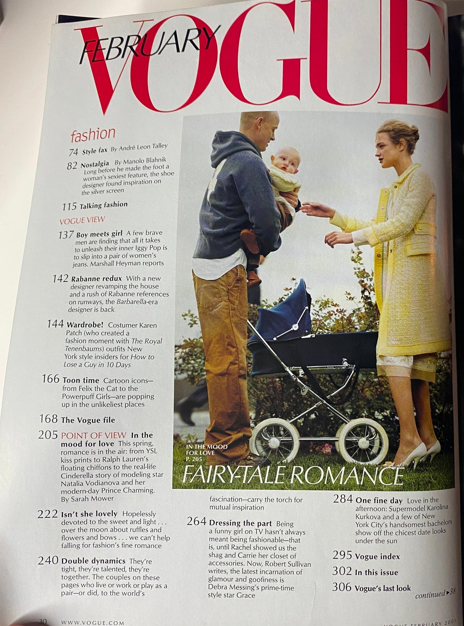 Inside page of Vogue Magazine February 2003 showcasing the Table of Contents, including fashion articles and highlights featuring Debra Messing.
