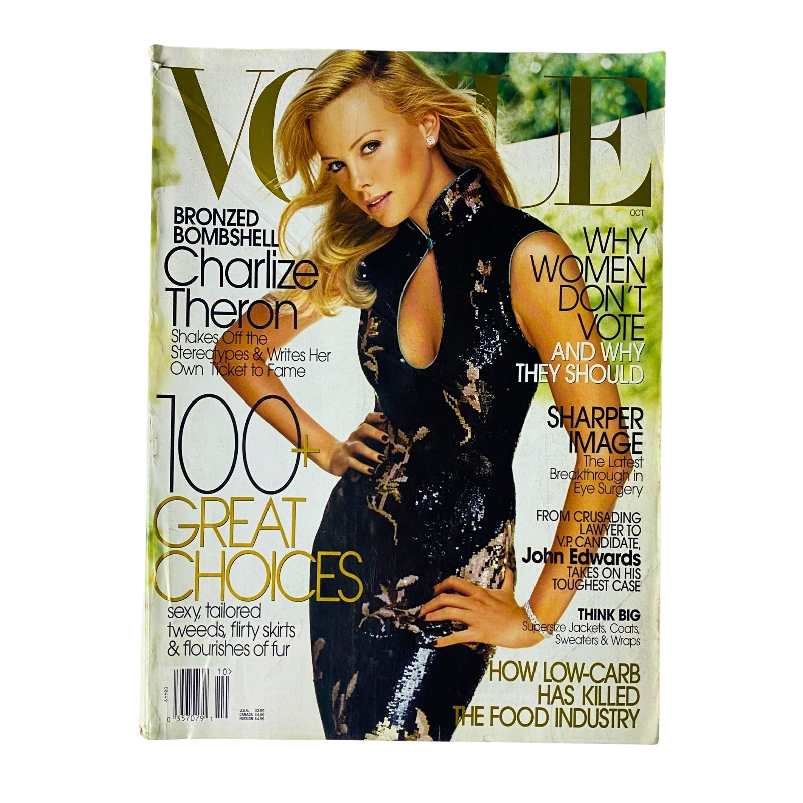 Cover of Vogue Magazine October 2004 featuring Charlize Theron, titled 'Bronzed Bombshell', showcasing her glamorous style and featuring the headline '100 Great Choices'.
