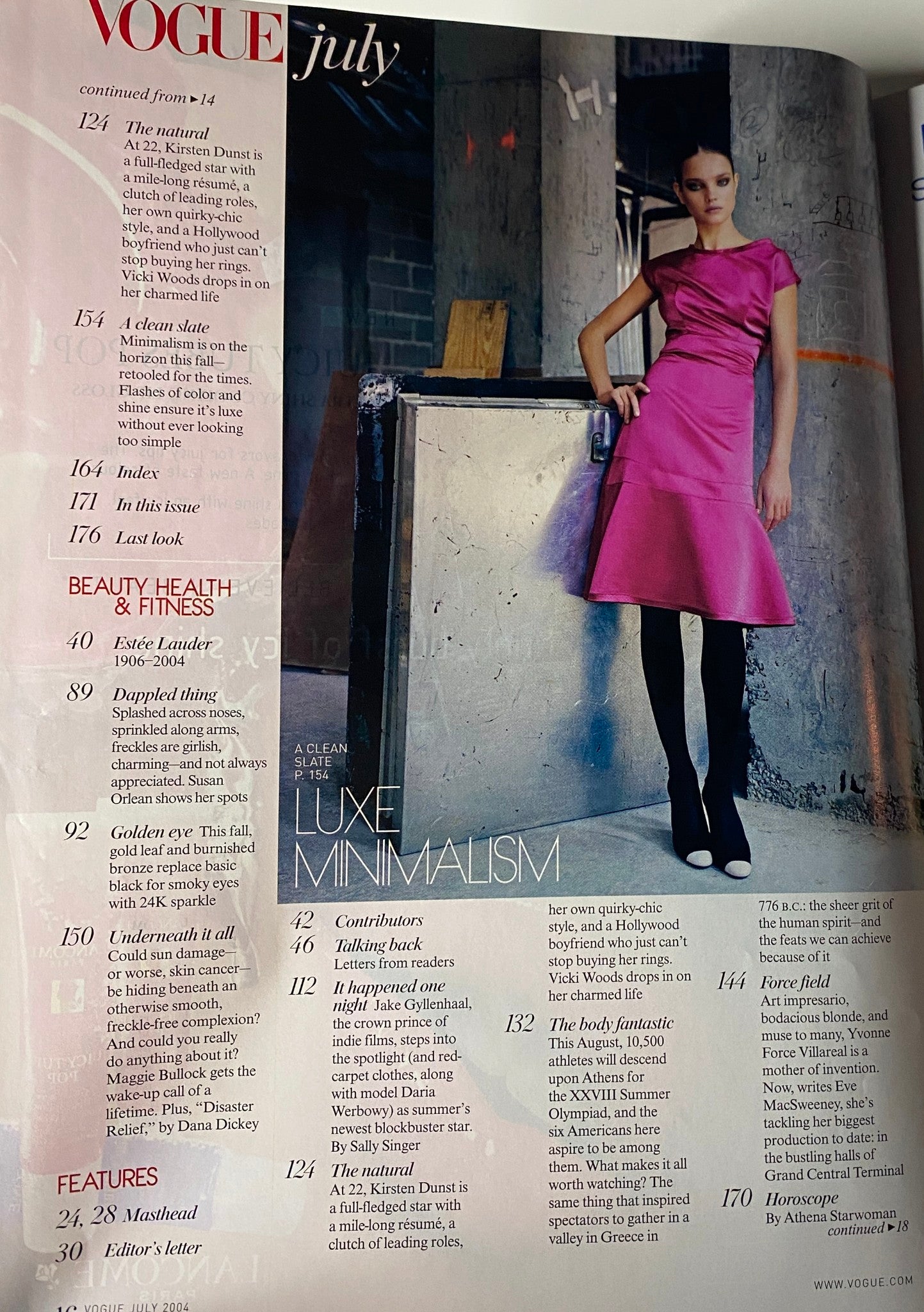 Interior page of Vogue Magazine July 2004 displaying a striking fashion editorial featuring a model in a pink dress, focused on luxe minimalism.