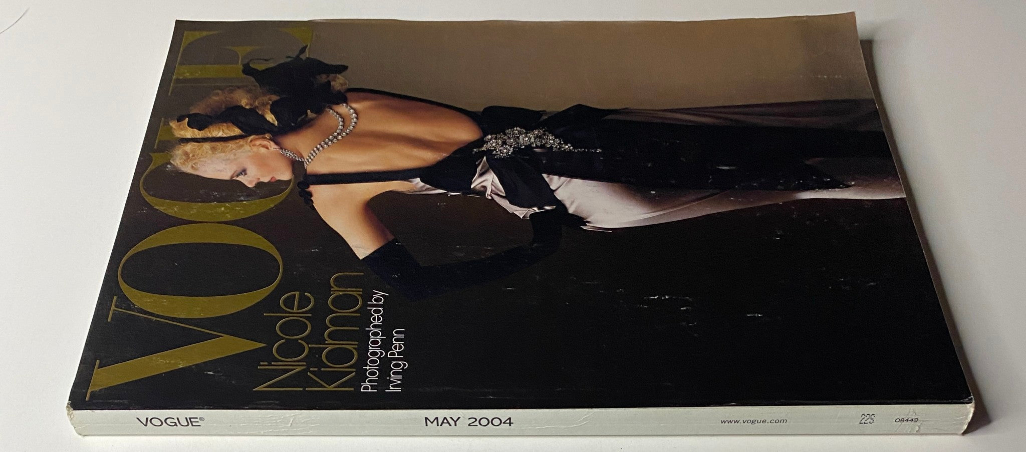 Vogue Magazine May 2004 Nicole Kidman Cover No Label showcasing Nicole Kidman in an elegant backless dress adorned with a large bow, photographed by Irving Penn.