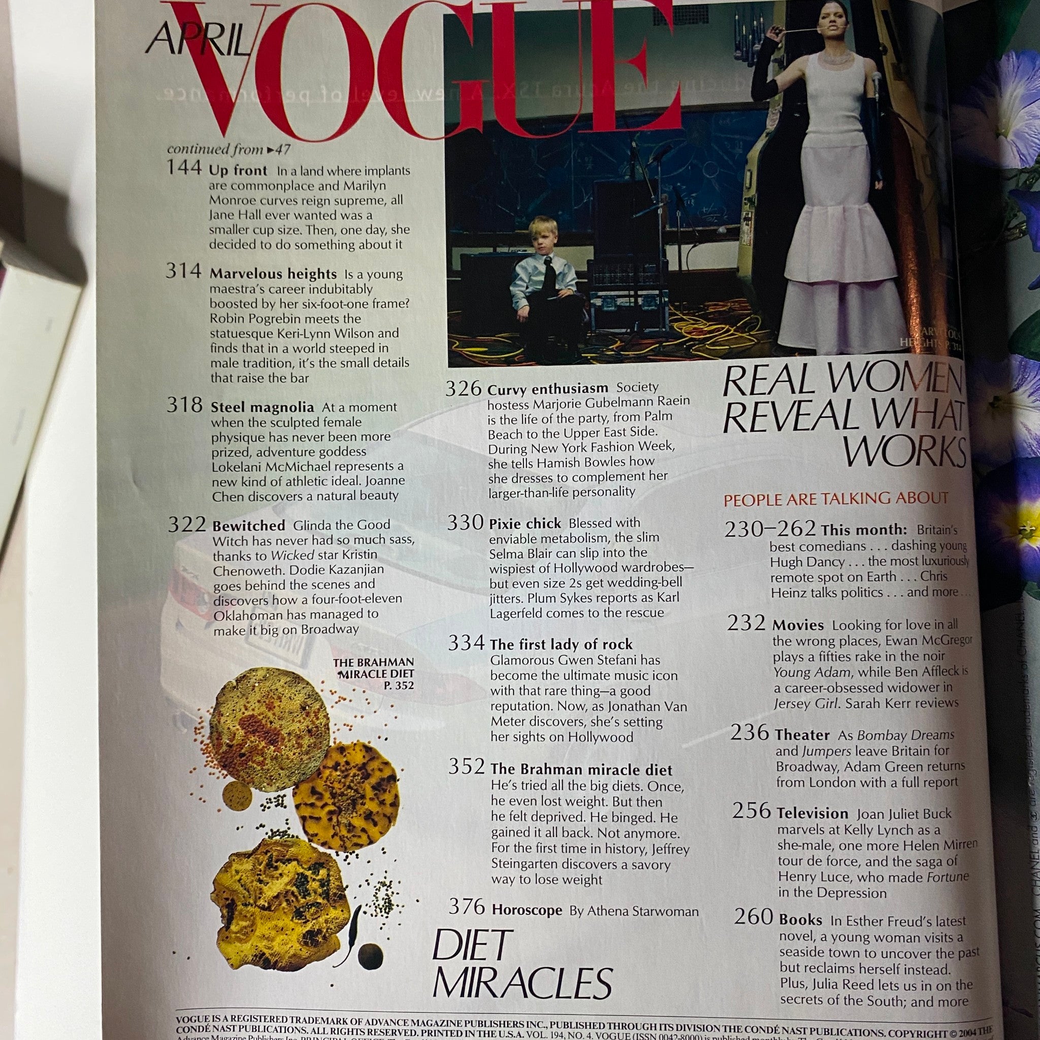 Continued contents page of April 2004 Vogue Magazine featuring articles on fashion and health, including 'Marvelous Heights' and 'Epic Proportions'.