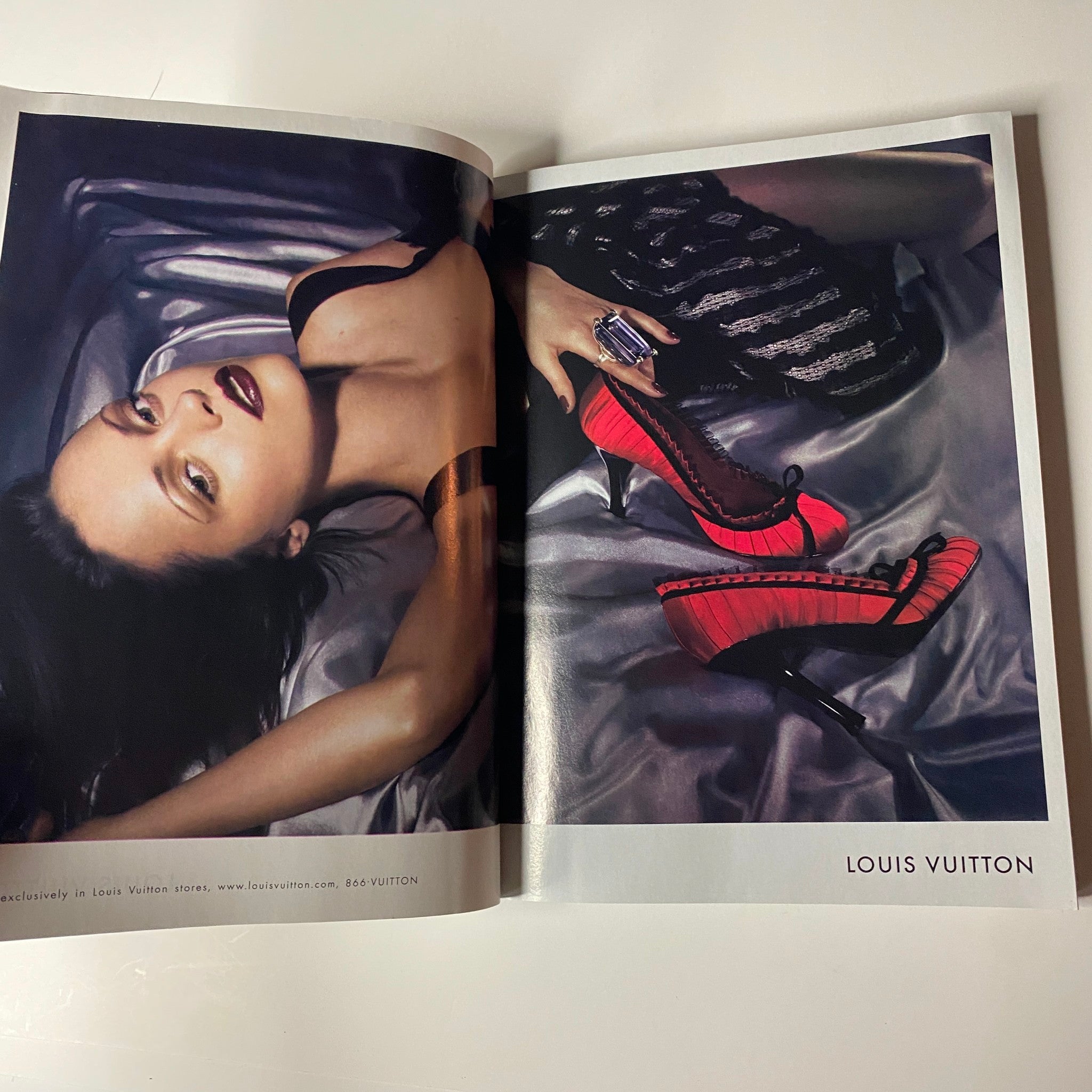 Fashion editorial page from Vogue Magazine October 2004 showcasing Louis Vuitton heels and high-fashion photography.