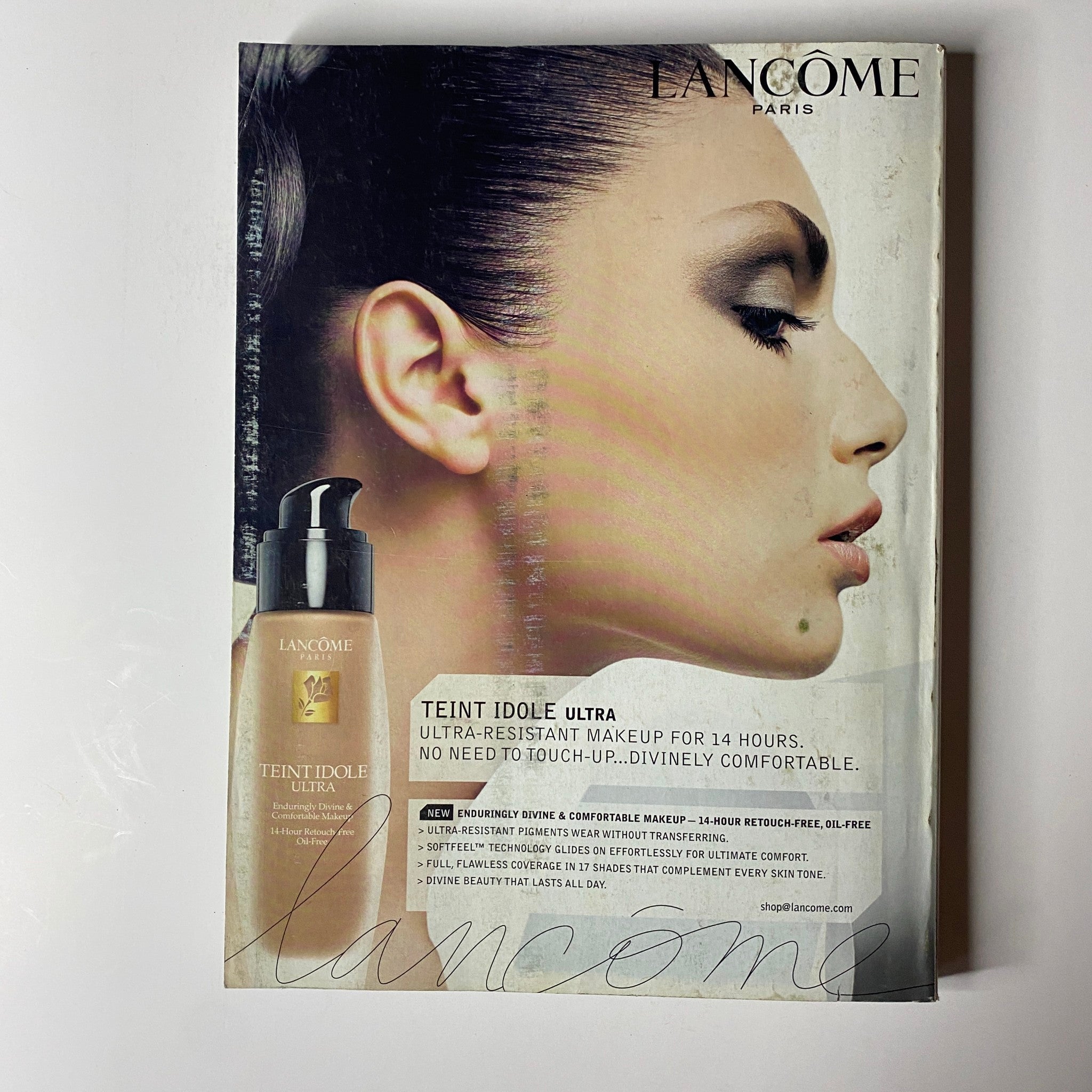 Lancôme advertisement from Vogue Magazine October 2005 focused on Teint Idole Ultra makeup with a model's profile.