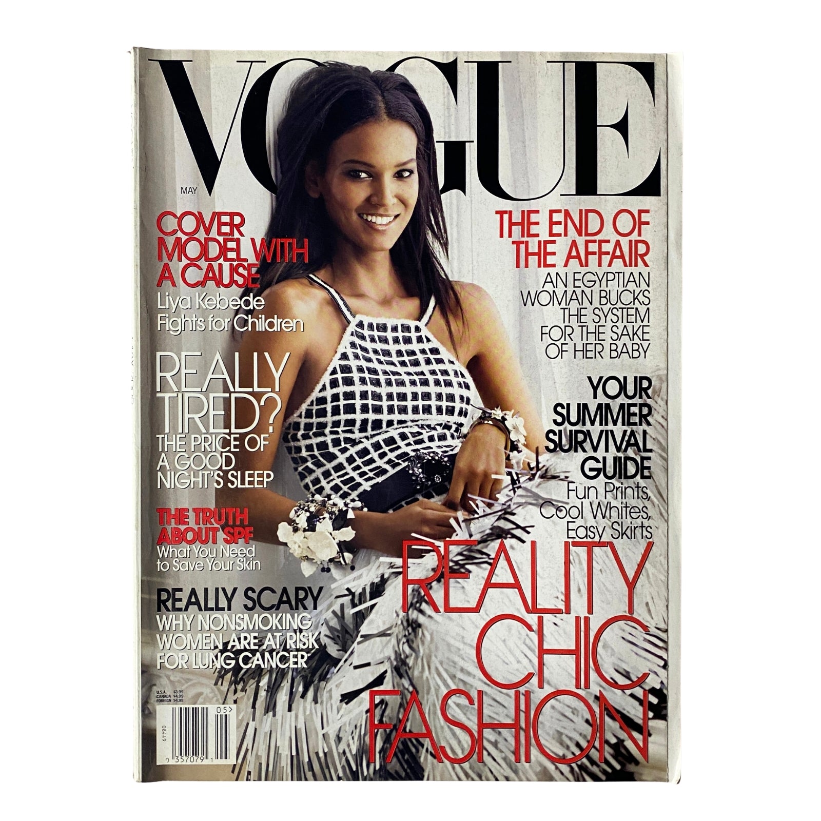 Vogue Magazine May 2005 cover featuring Ethiopian supermodel Liya Kebede in a stylish Chanel Haute Couture outfit with a sequin halter top and fringe skirt, highlighting the theme of reality chic fashion alongside the magazine's notable articles.