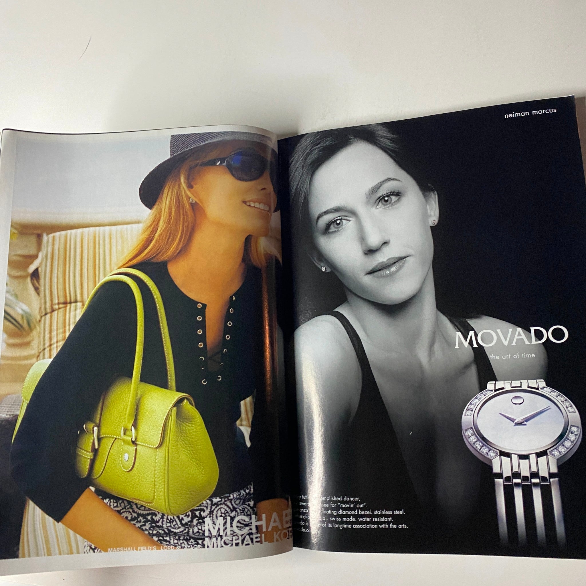 Interior page of Vogue Magazine May 2005 featuring a fashion advertisement for Movado, highlighting luxury watch design, complemented by a stylish model wearing a bright green handbag.