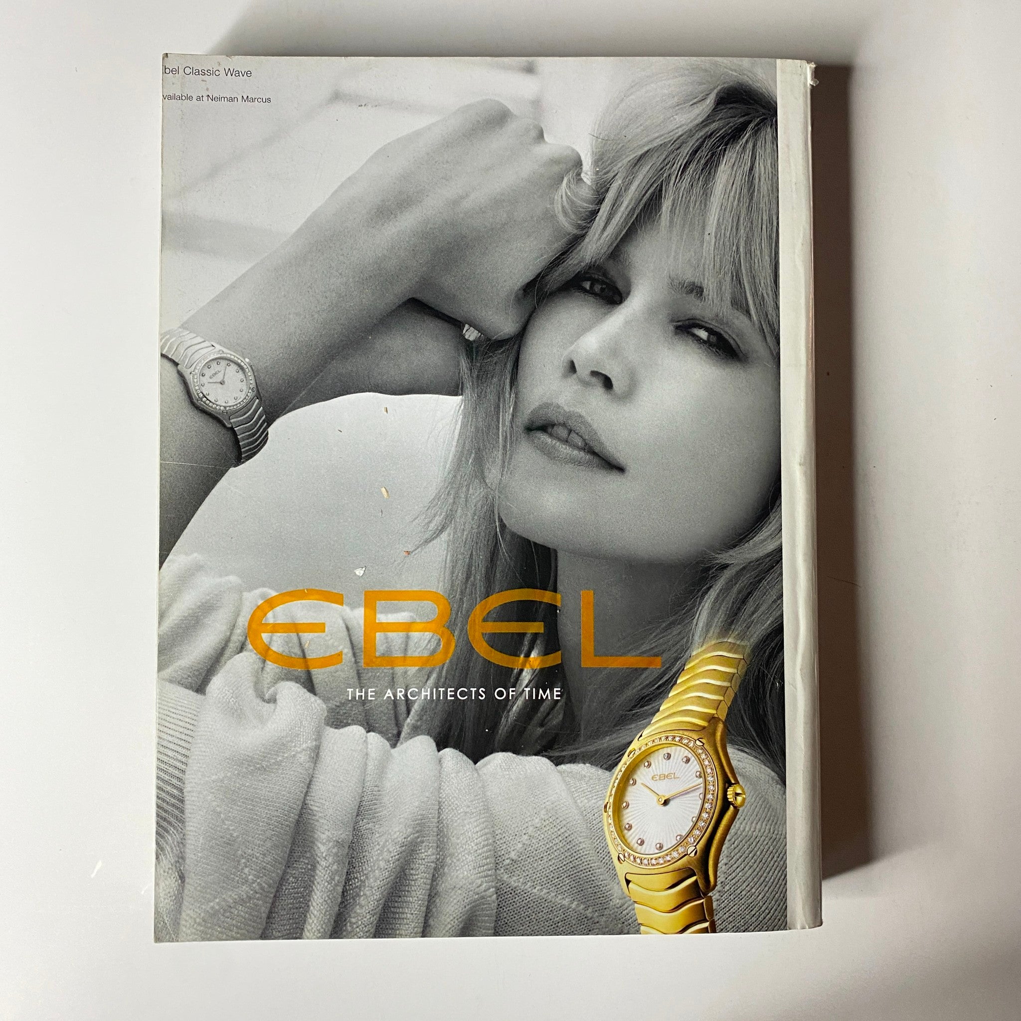 Ebel advertisement featured in Vogue Magazine September 2004, showcasing a model wearing a stylish watch, emphasizing the brand's tagline 'The Architects of Time'.