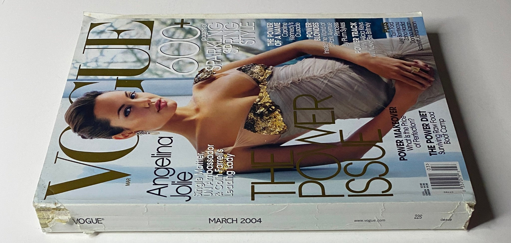 Vogue Magazine March 2004 featuring Angelina Jolie on the cover; the magazine emphasizes 600+ pages of sparkling spring style and highlights her influence in Hollywood.