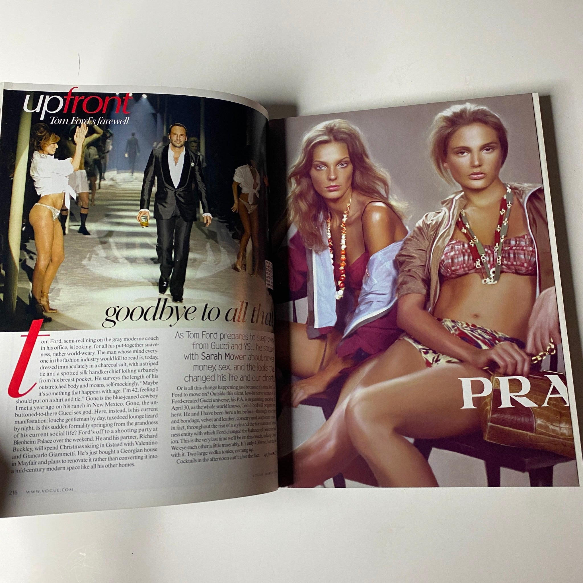 Inside Vogue Magazine March 2004, a two-page spread with Tom Ford announcing his departure from Gucci, featuring models in fashionable attire.
