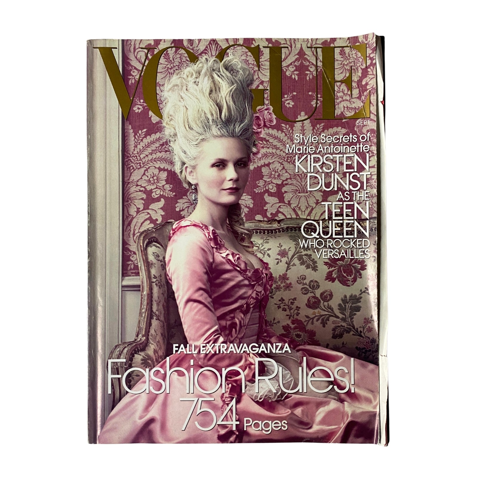 Cover of Vogue Magazine September 2006 featuring Kirsten Dunst as Marie Antoinette, with the headline 'Fashion Rules!' and a backdrop of ornate decor.