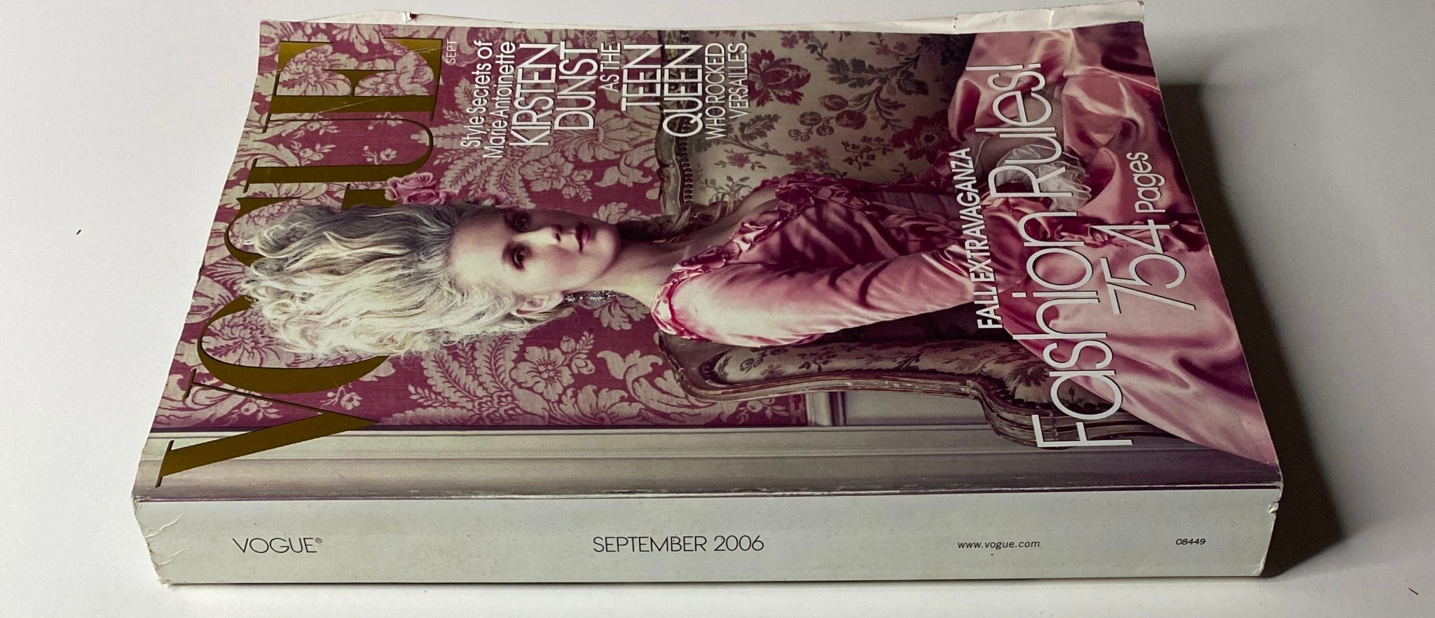 Side view of the Vogue Magazine September 2006 cover showcasing Kirsten Dunst dressed as Marie Antoinette, highlighting the magazine's edition details.