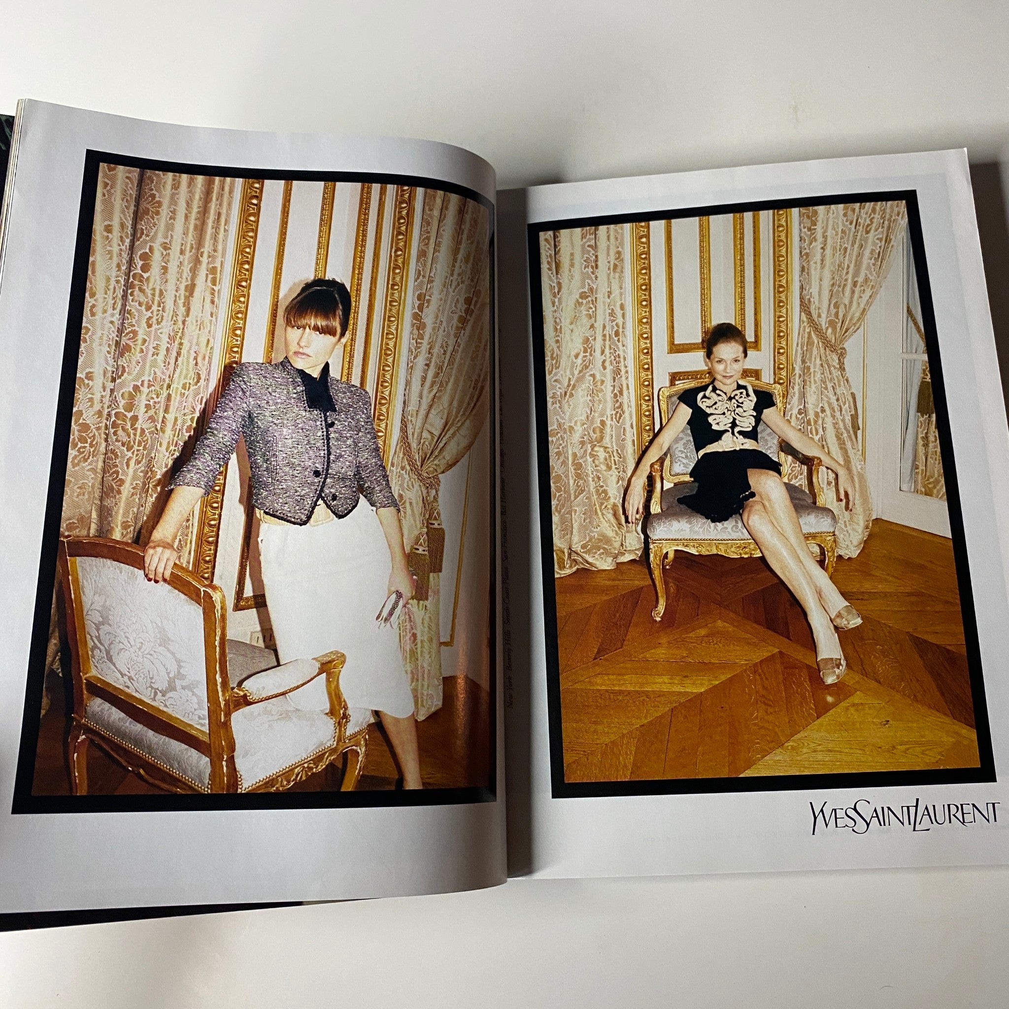 Vogue Magazine March 2006 displaying captivating editorial images from Yves Saint Laurent, reflecting exquisite fashion photography in very good condition.