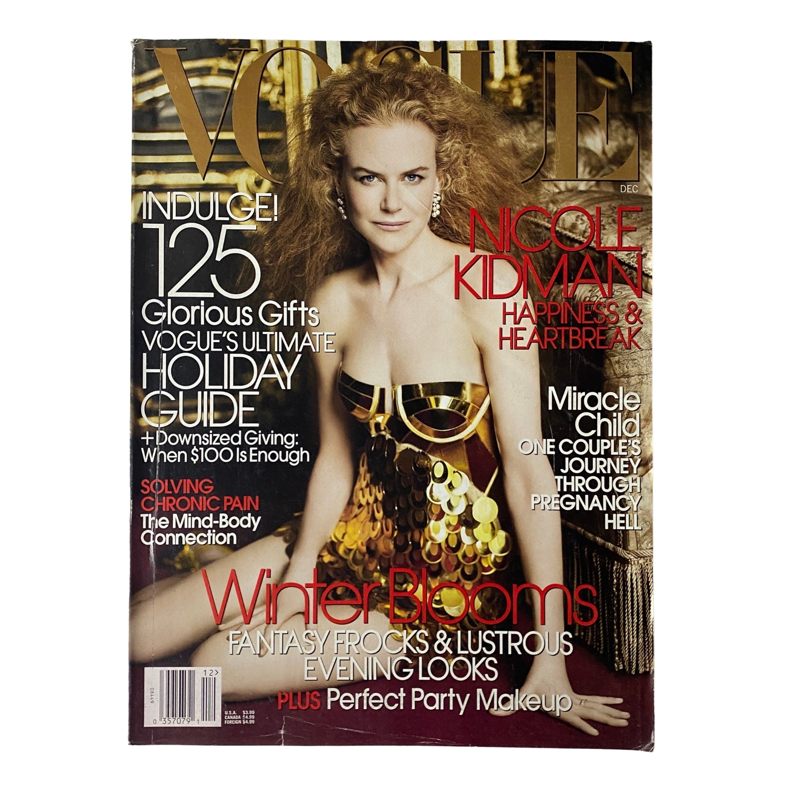 Vogue Magazine December 2006 Nicole Kidman Cover featuring Nicole Kidman in a gold and black dress, showcasing seasonal fashion themes and holiday gift ideas.