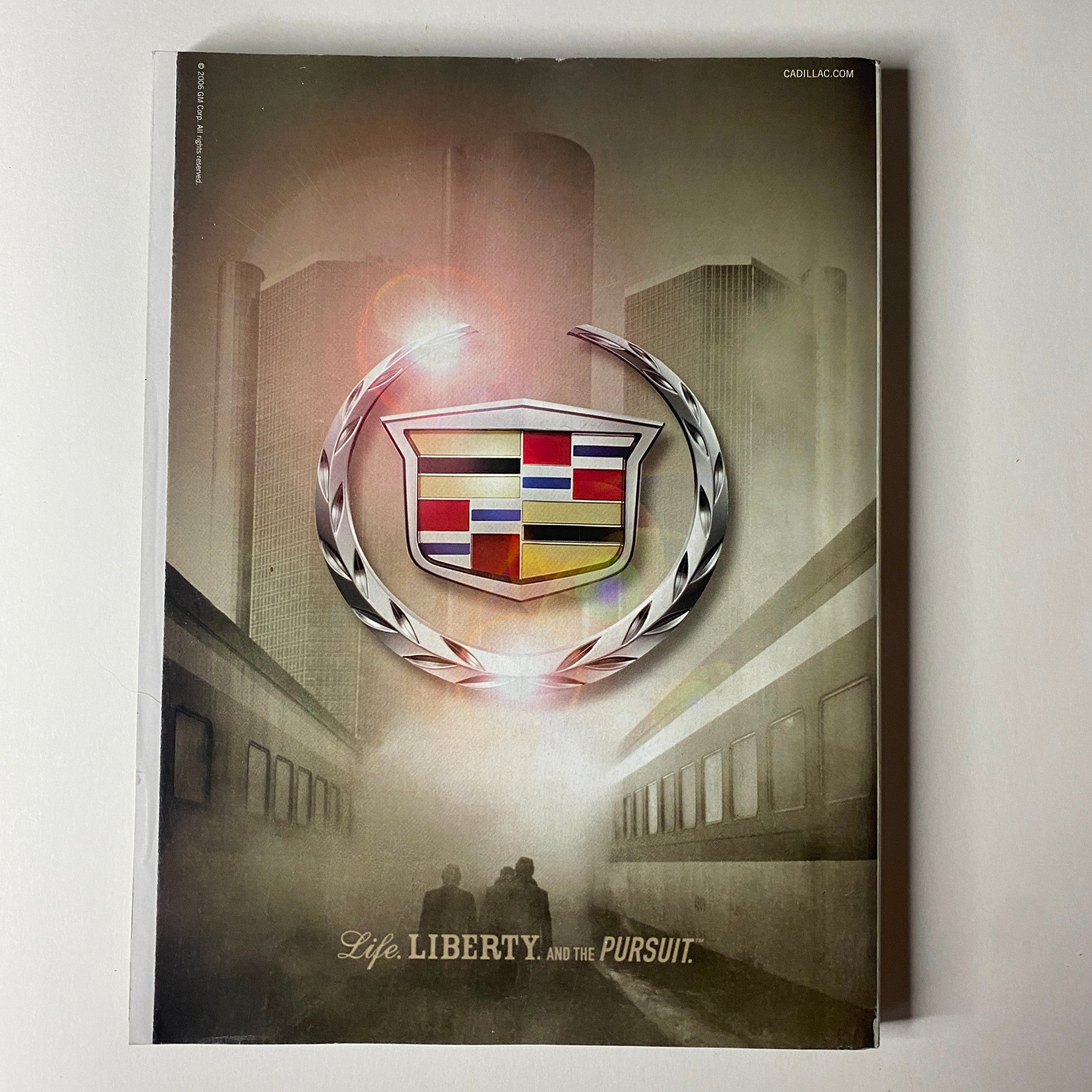 Vogue Magazine November 2006 back cover displaying a Cadillac advertisement emphasizing luxury and lifestyle.