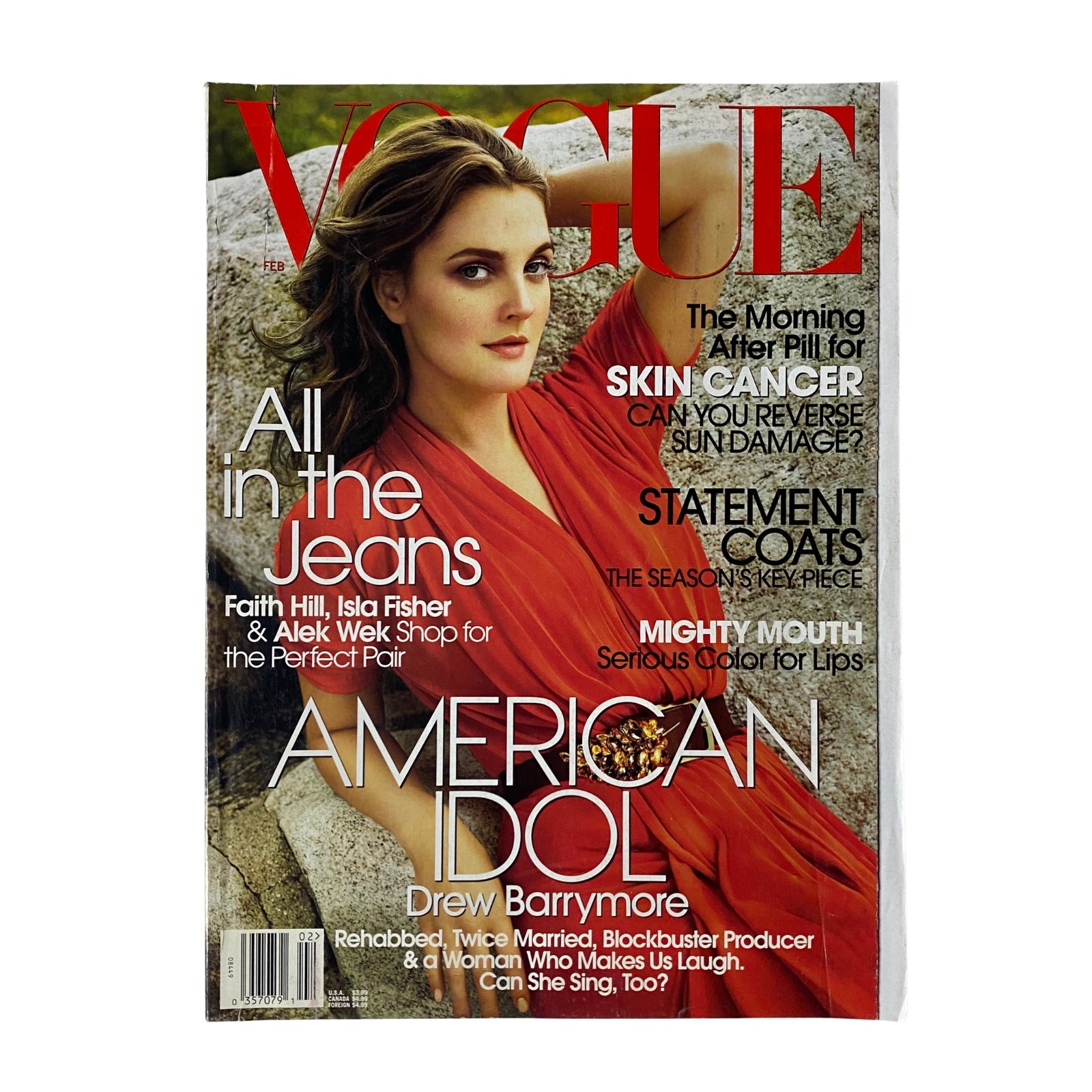 Cover of Vogue Magazine February 2006 featuring Drew Barrymore, with the title 'American Idol' highlighted. The issue includes features on fashion trends and cultural commentary, making it a collectible for mid-2000s fashion enthusiasts.