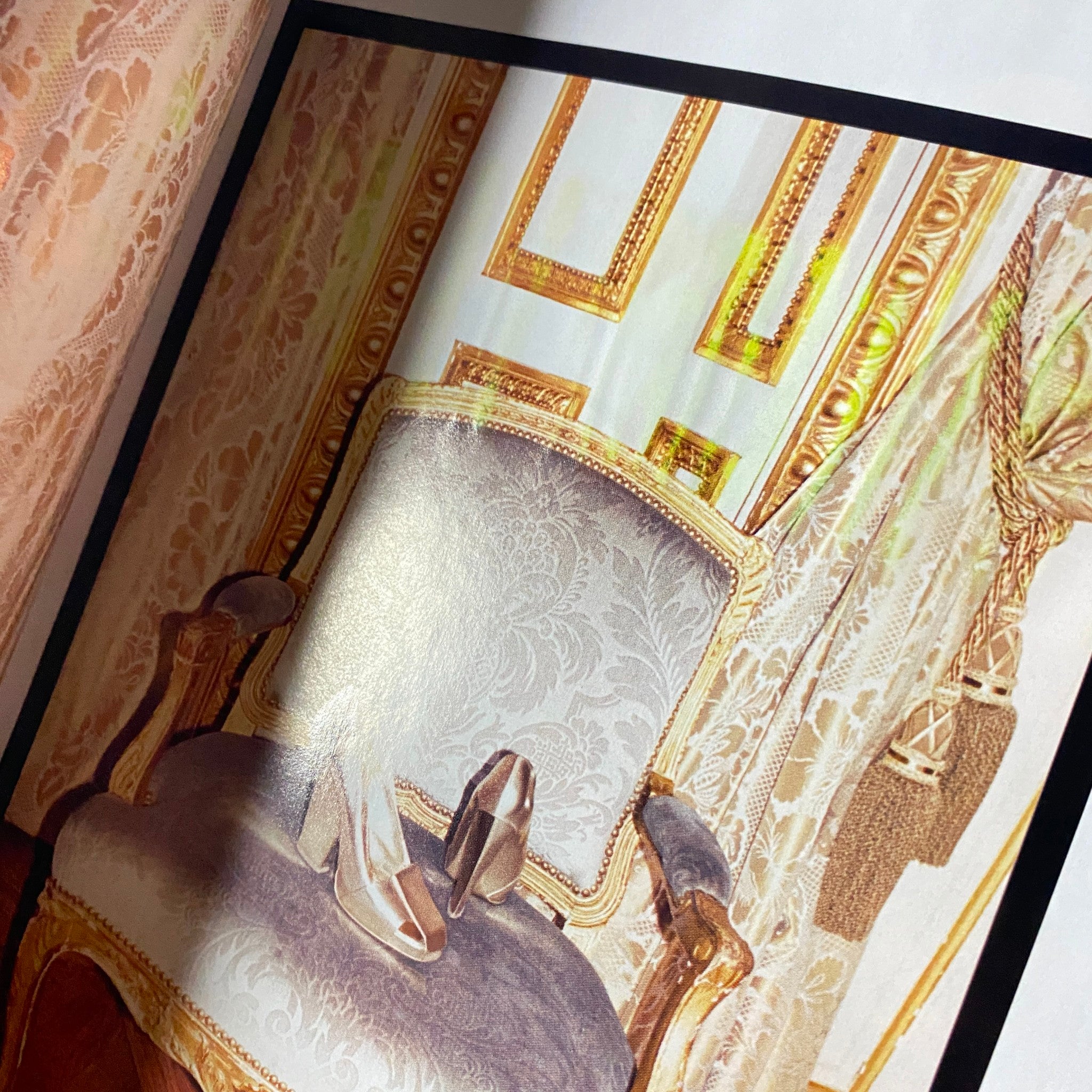 Vogue Magazine February 2006 Drew Barrymore Cover - An artistic interior shot featuring an ornate chair and decorative details, representing luxury and design in a sophisticated setting.