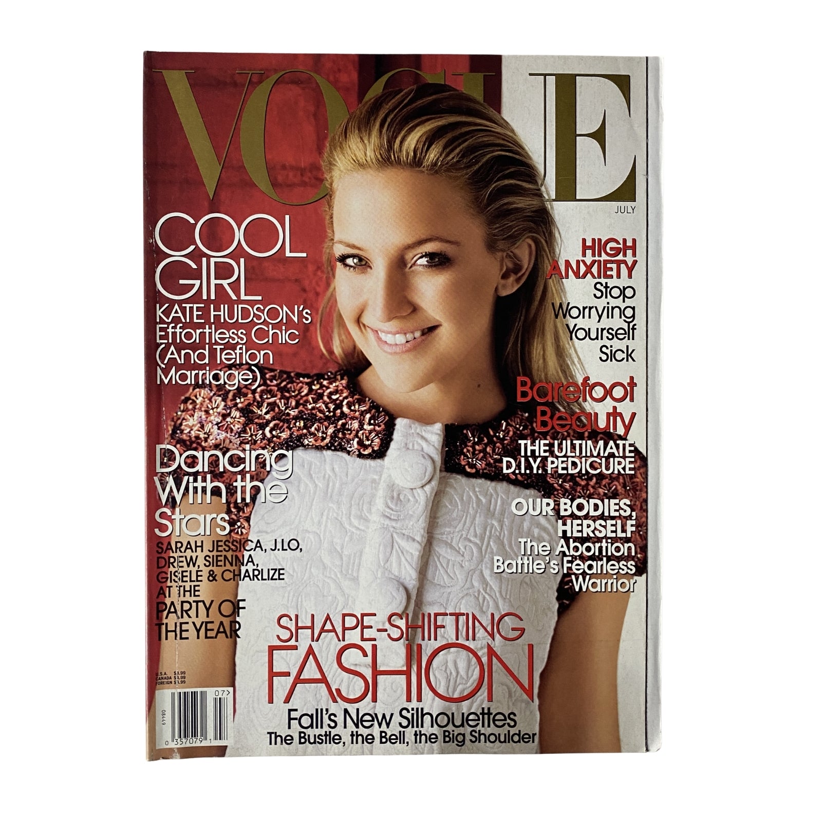 Vogue Magazine July 2006 cover featuring Kate Hudson, showcasing her effortless style and beauty. The issue highlights fashion trends and celebrity insights, ideal for collectors of fashion history.