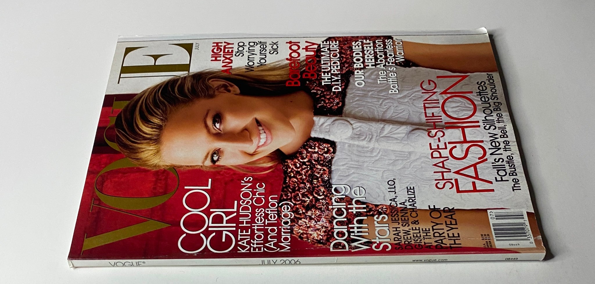 Vogue Magazine July 2006 Kate Hudson Cover showcasing her radiant smile and high fashion, in very good condition without a label.