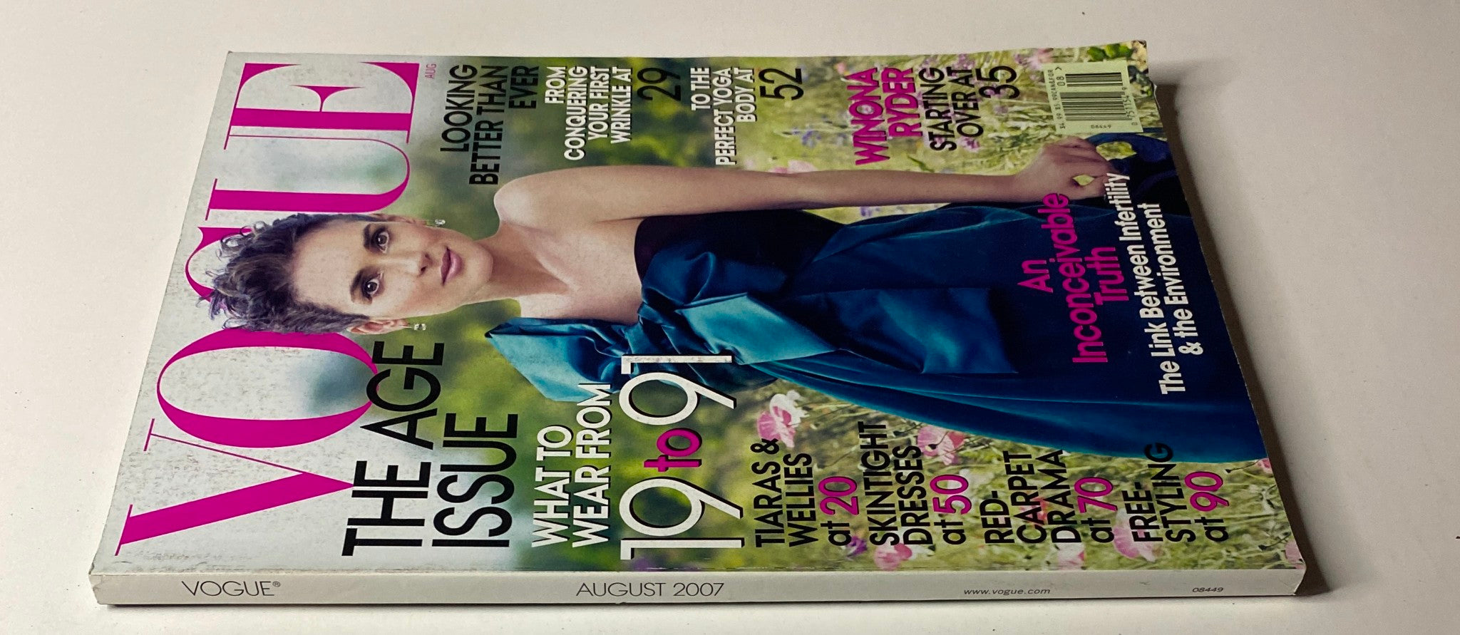Vogue Magazine August 2007 edition featuring a close-up view of Winona Ryder on the cover in an elegant blue dress. The magazine emphasizes beauty and fashion at every age, under 'The Age Issue'.