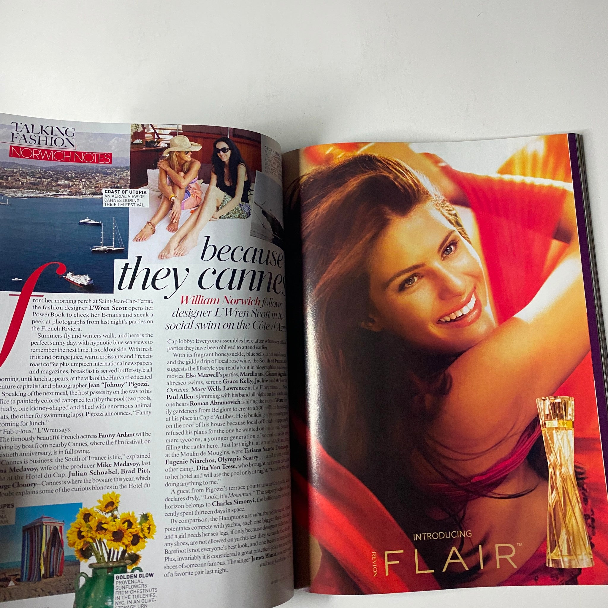 Vogue Magazine August 2007, featuring an advertisement for Flair perfume, showcasing a radiant model with long flowing hair, emphasizing beauty and elegance in the fashion world.