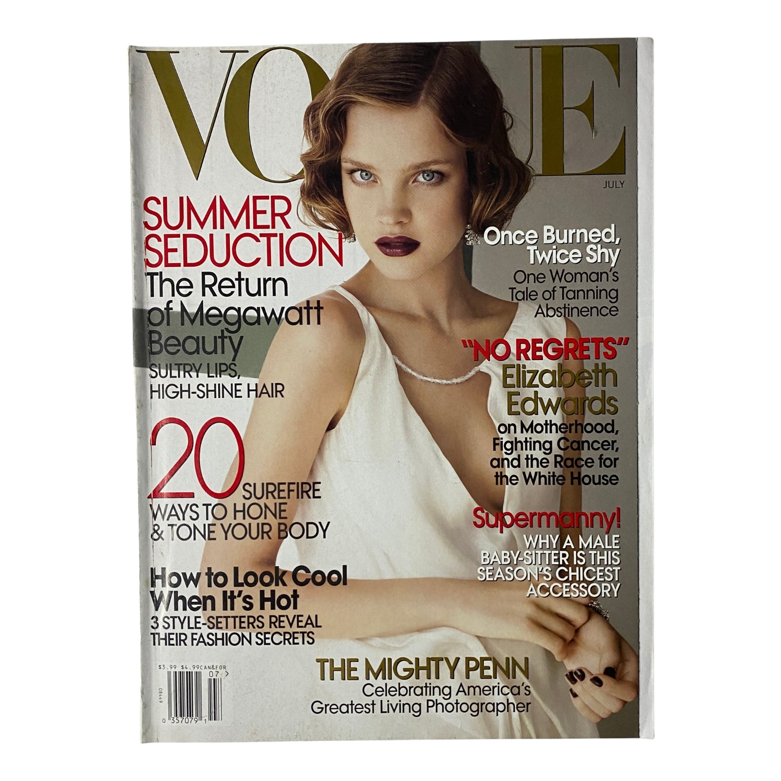 Vogue Magazine July 2007 cover featuring model Natalia Vodianova in a white silk organza dress, with headlines about summer beauty tips and a tribute to photographer Irving Penn.