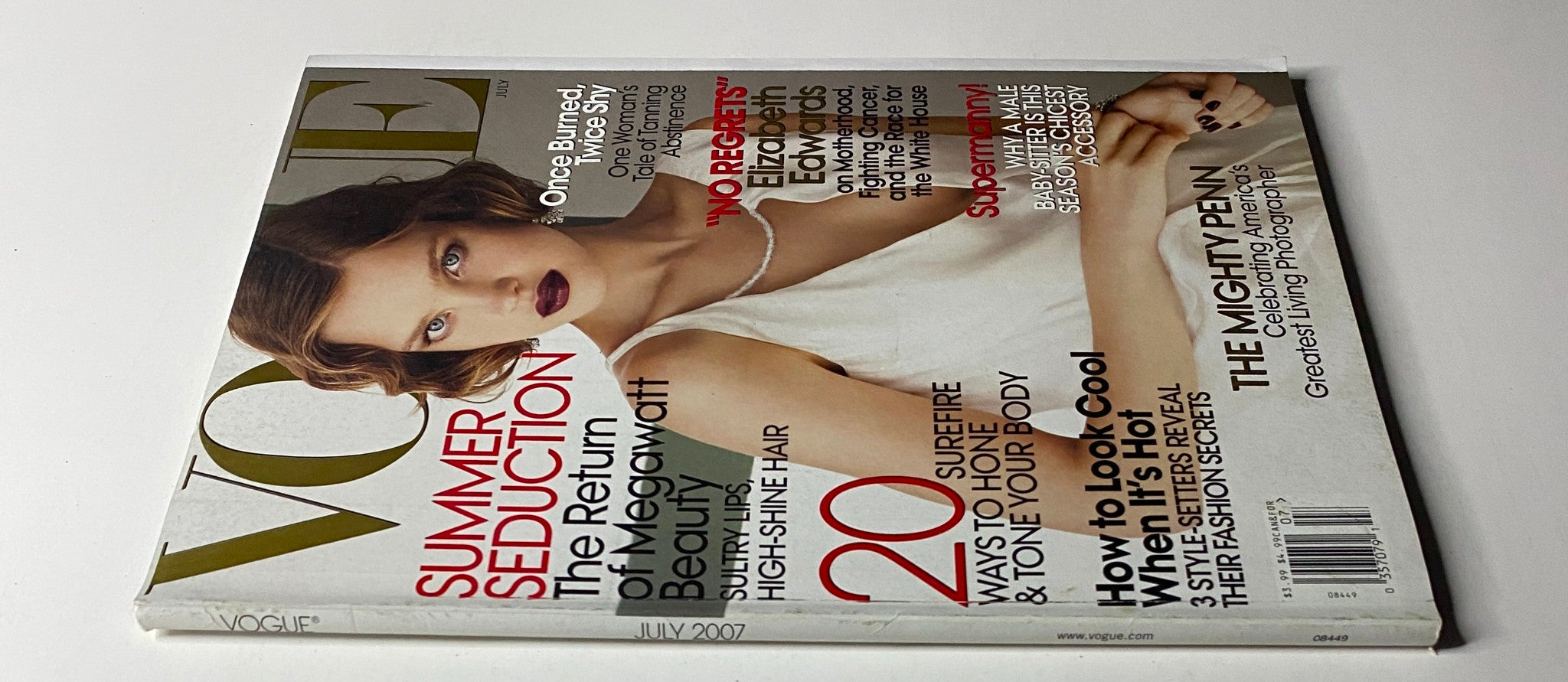 Cover of Vogue Magazine July 2007 featuring model Natalia Vodianova, showcasing summer fashion and elegant styling.
