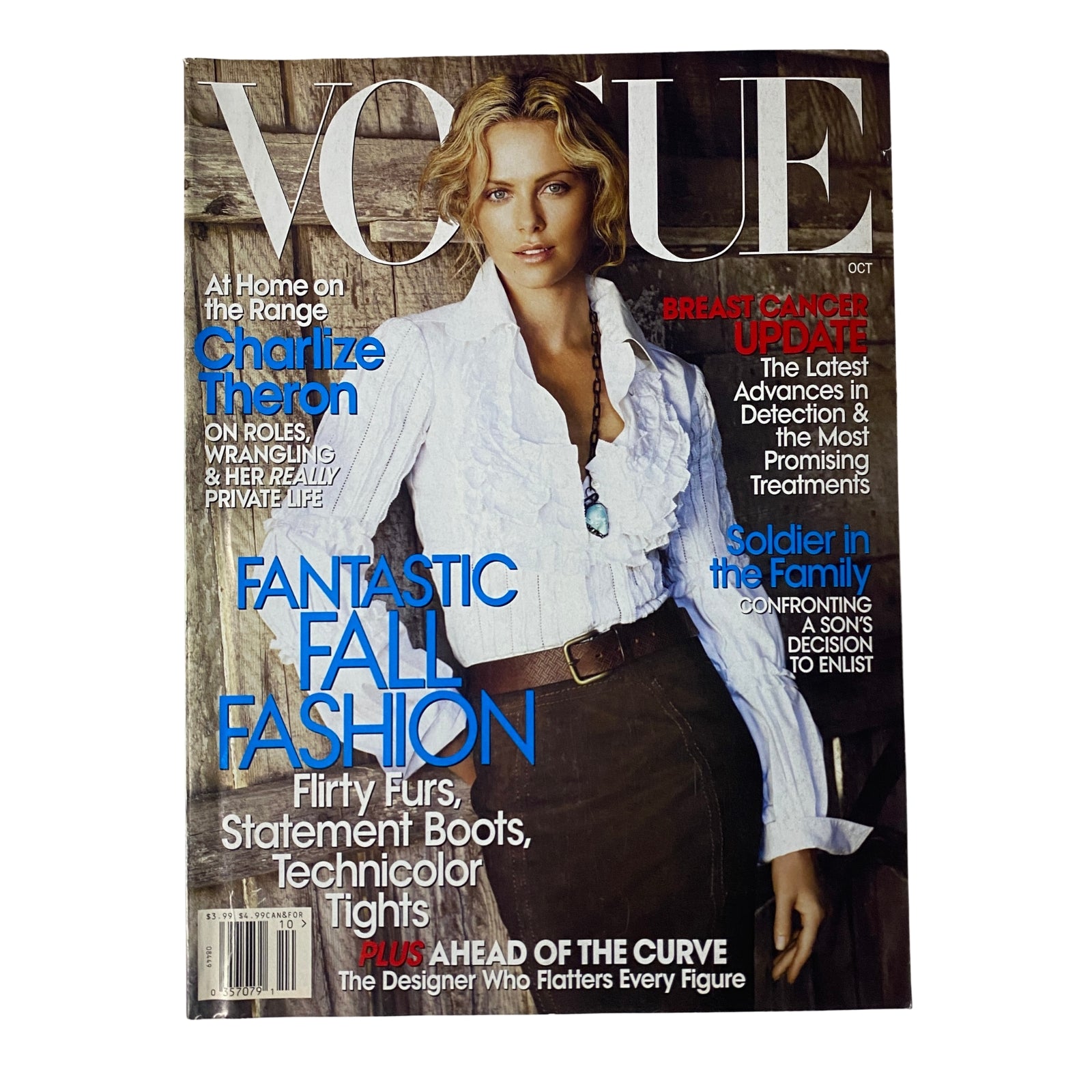 Vogue Magazine October 2007 featuring Charlize Theron on the cover, styled in a white blouse and stylish brown skirt, highlighting themes of fashion and beauty.