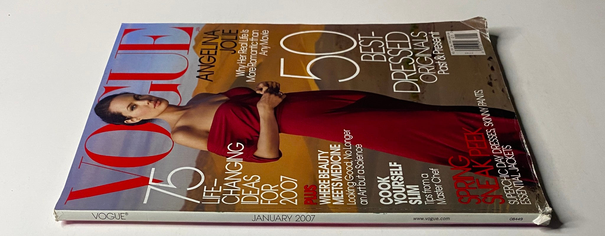 Vogue Magazine January 2007 featuring Angelina Jolie on the cover. The magazine includes insights on personal styling, beauty trends, and a sneak peek into the fashion world of 2007.