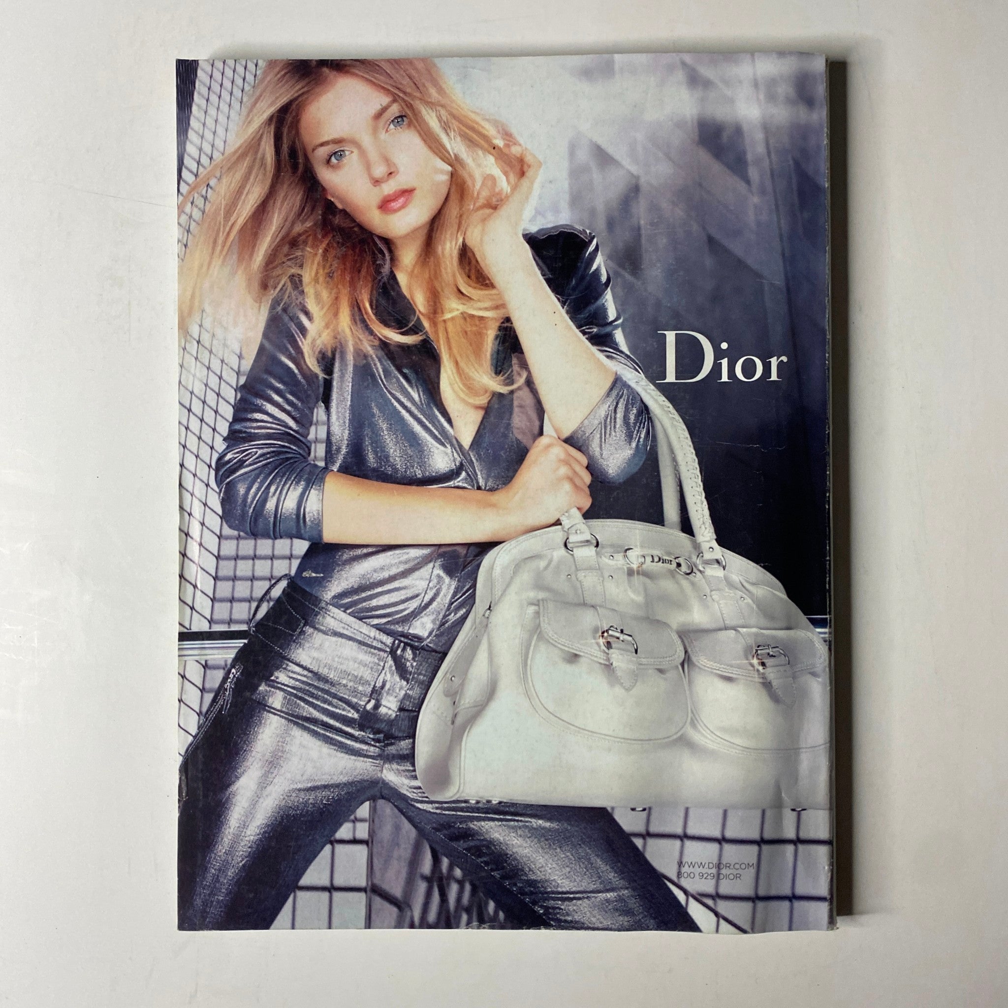 Vogue Magazine February 2007 Renée Zellweger Cover No Label VG featuring fashion photography of a model in a metallic outfit holding a Dior handbag, showcasing luxury style trends.