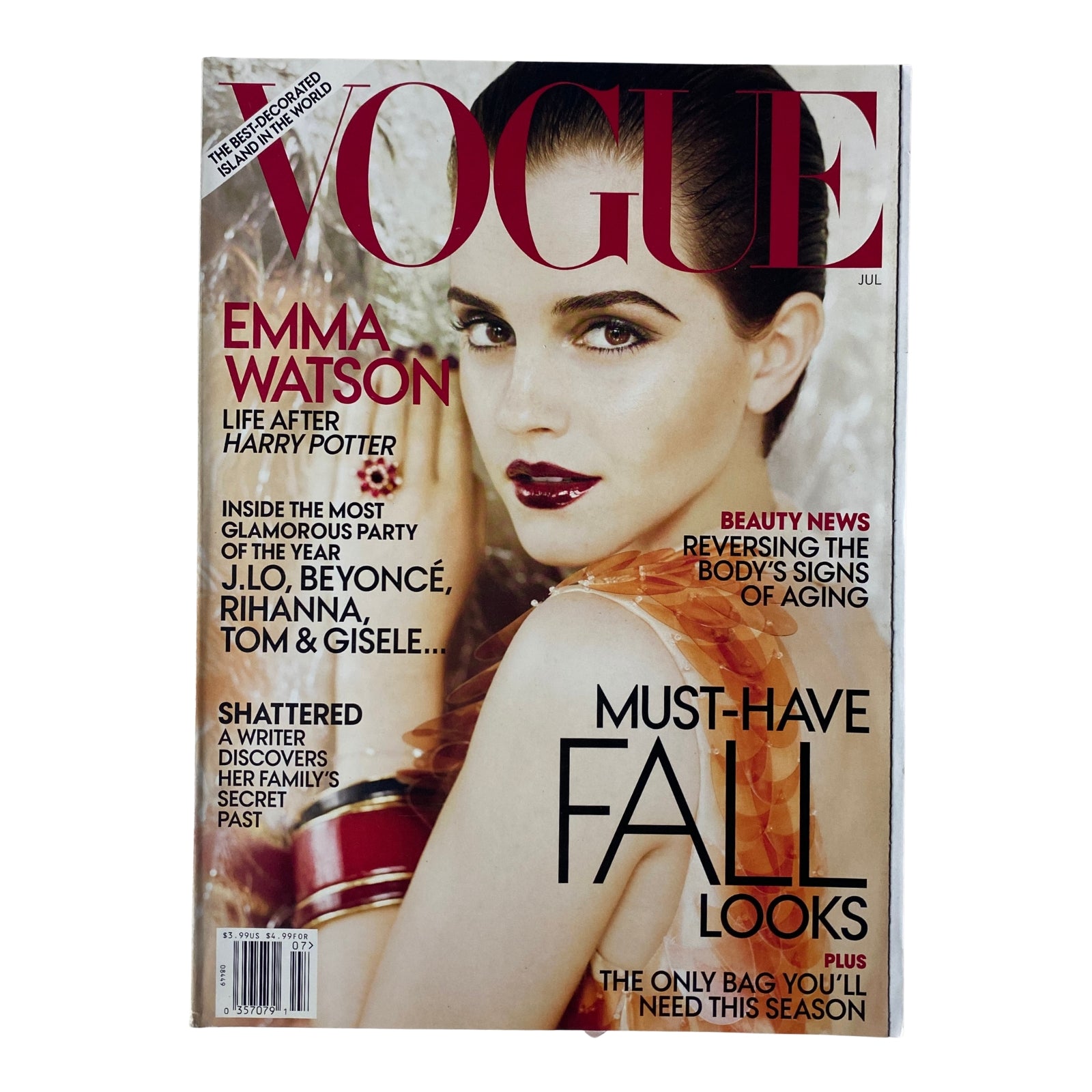 Vogue Magazine July 2011 featuring Emma Watson on the cover, highlighting her transition from Harry Potter. The magazine emphasizes must-have fall looks and includes editorial photography.