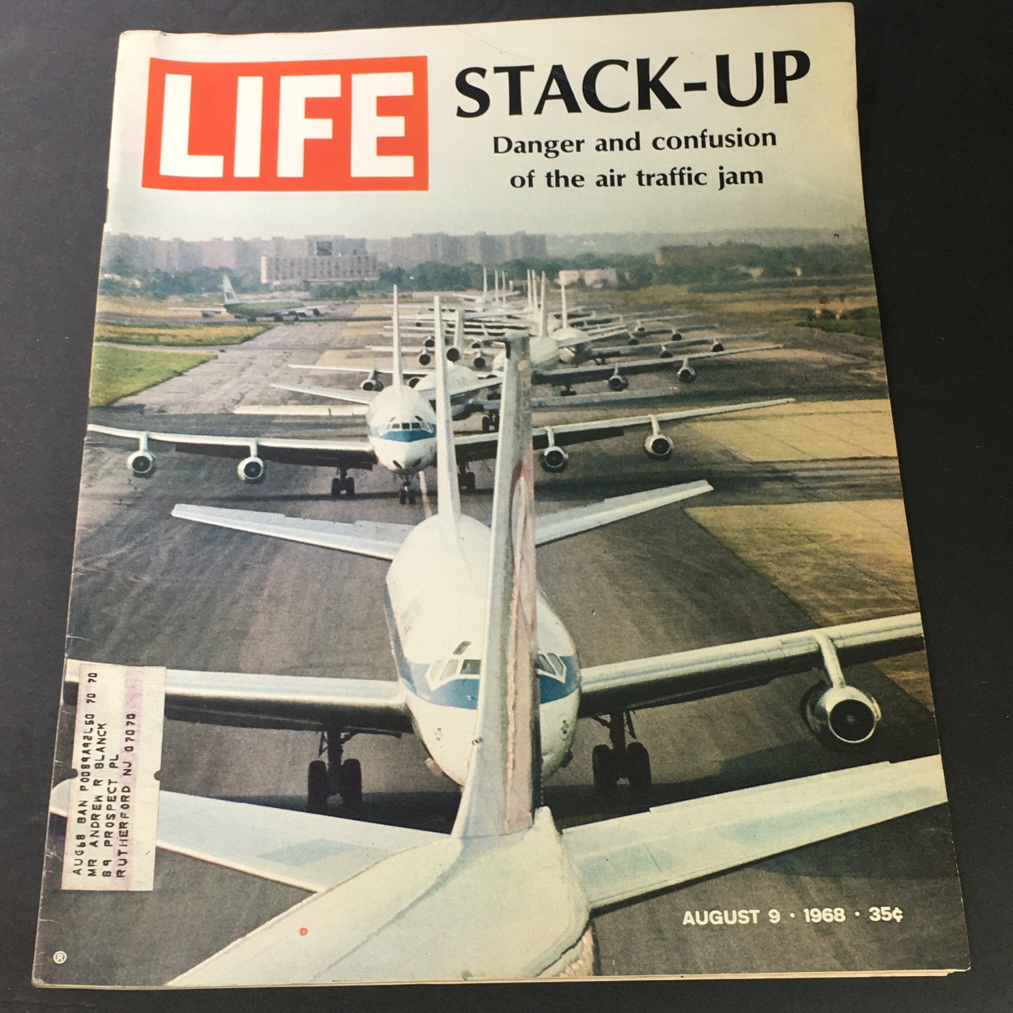 Vintage Life Magazine cover featuring the title 'Stack-Up Danger & Confusion in Air Traffic Jam' from August 9, 1968, illustrating multiple airplanes lined up on a runway.