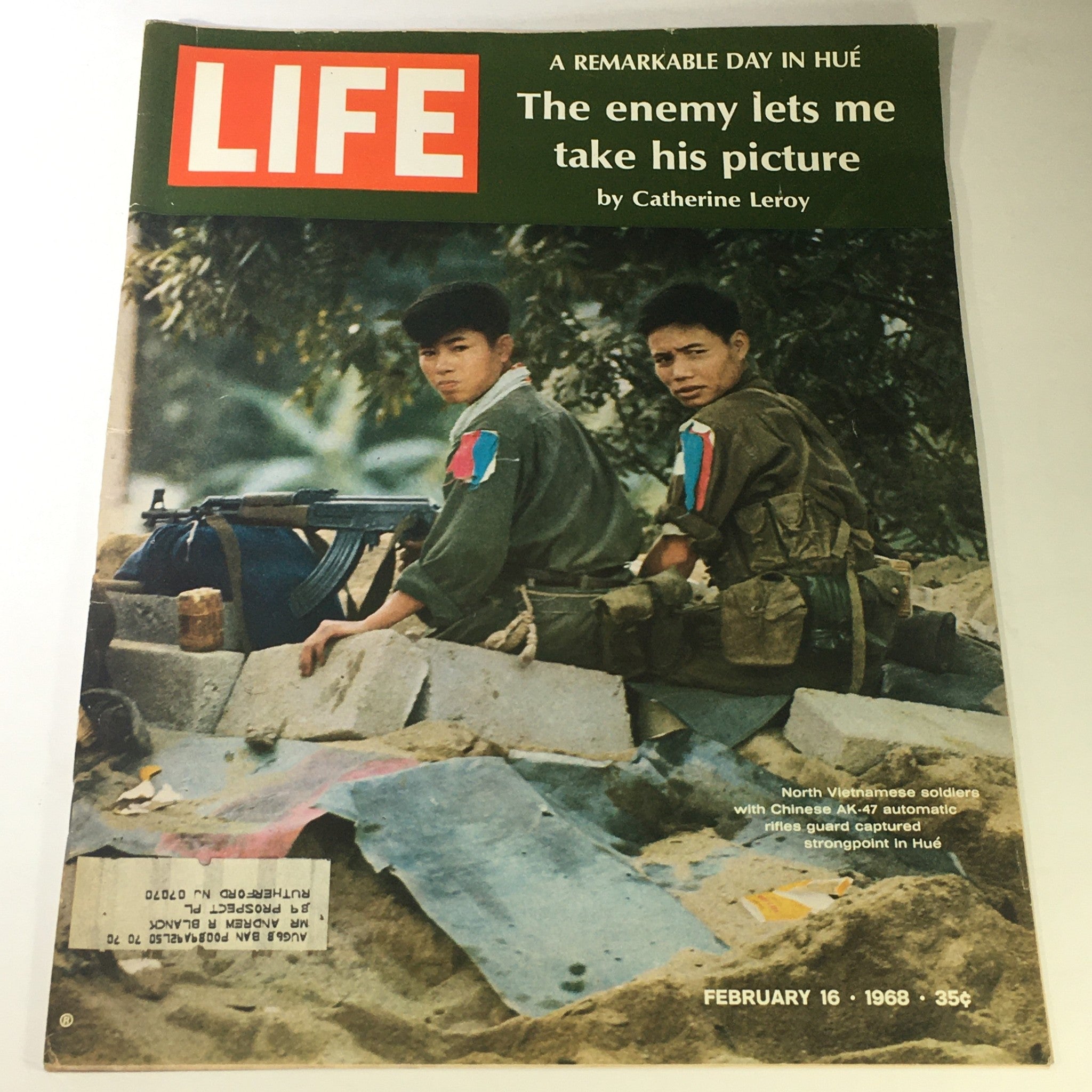 VTG Life Magazine February 16 1968 cover featuring North Vietnamese soldiers with AK-47 rifles during the Vietnam War, titled 'A Remarkable Day in Hue' by Catherine Leroy.