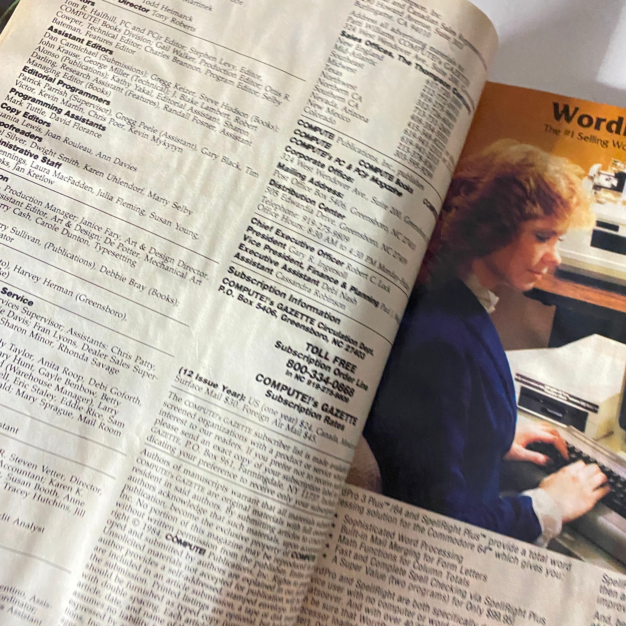 Interior page of Compute Gazette Magazine October 1984 showing subscription information and an image of a woman typing at a computer, representing the era of personal computing.