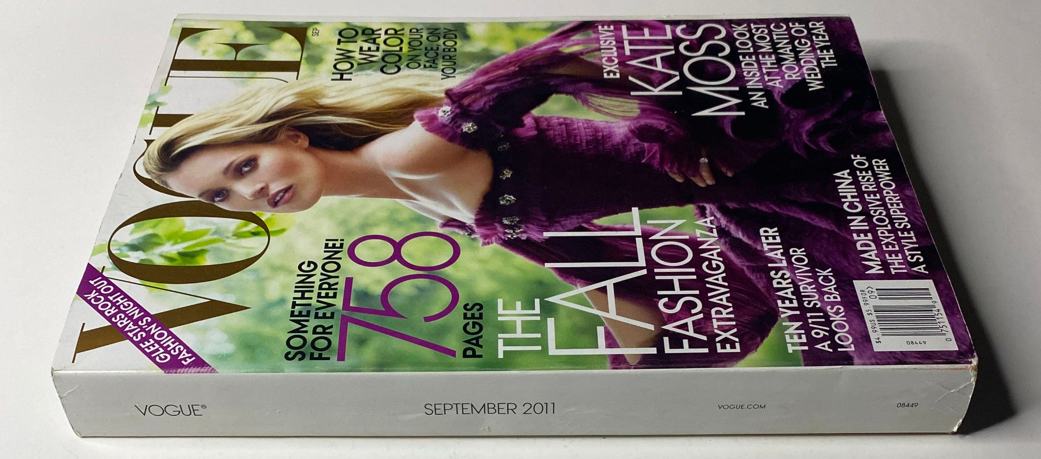Vogue Magazine September 2011 with Kate Moss on the cover, displaying the magazine's title and prominent cover lines, emphasizing the exclusive content on the year's most romantic wedding.