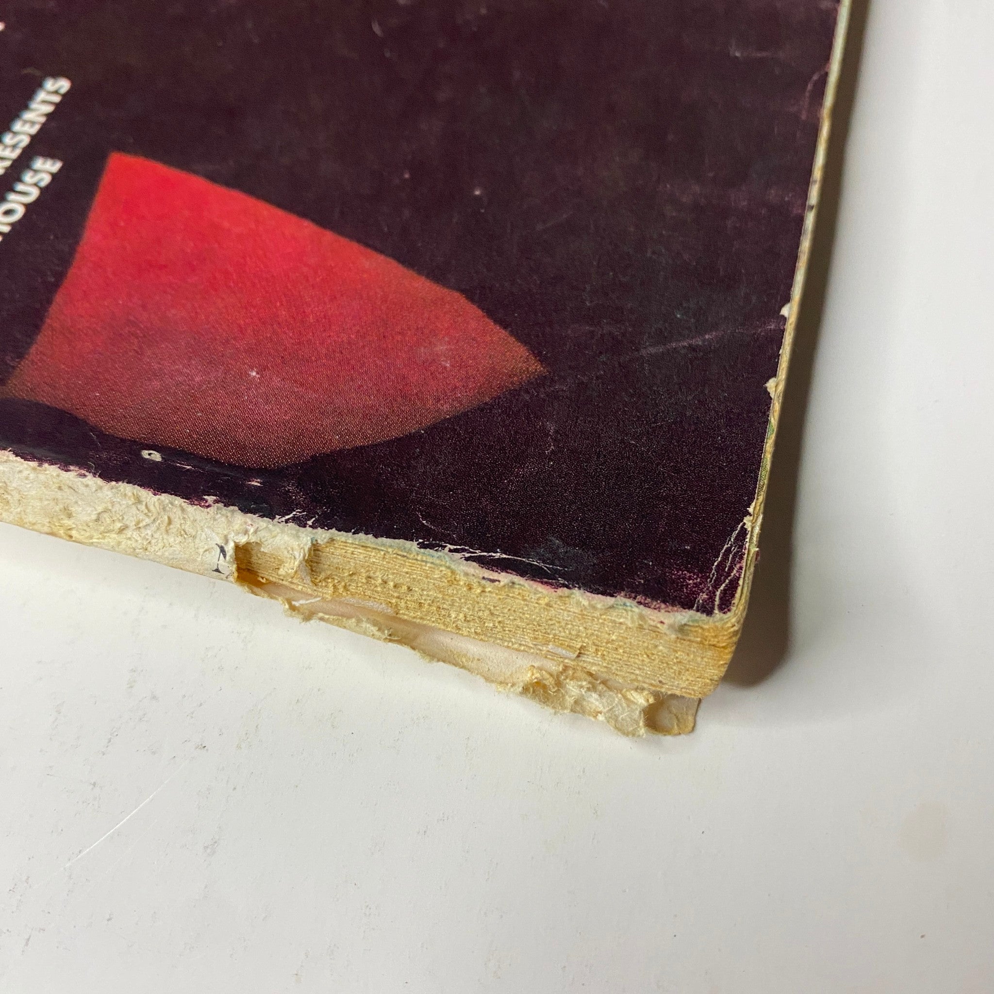 Vogue Magazine November 15, 1961 side view showing the worn edges of the magazine cover, indicating its vintage character and history.