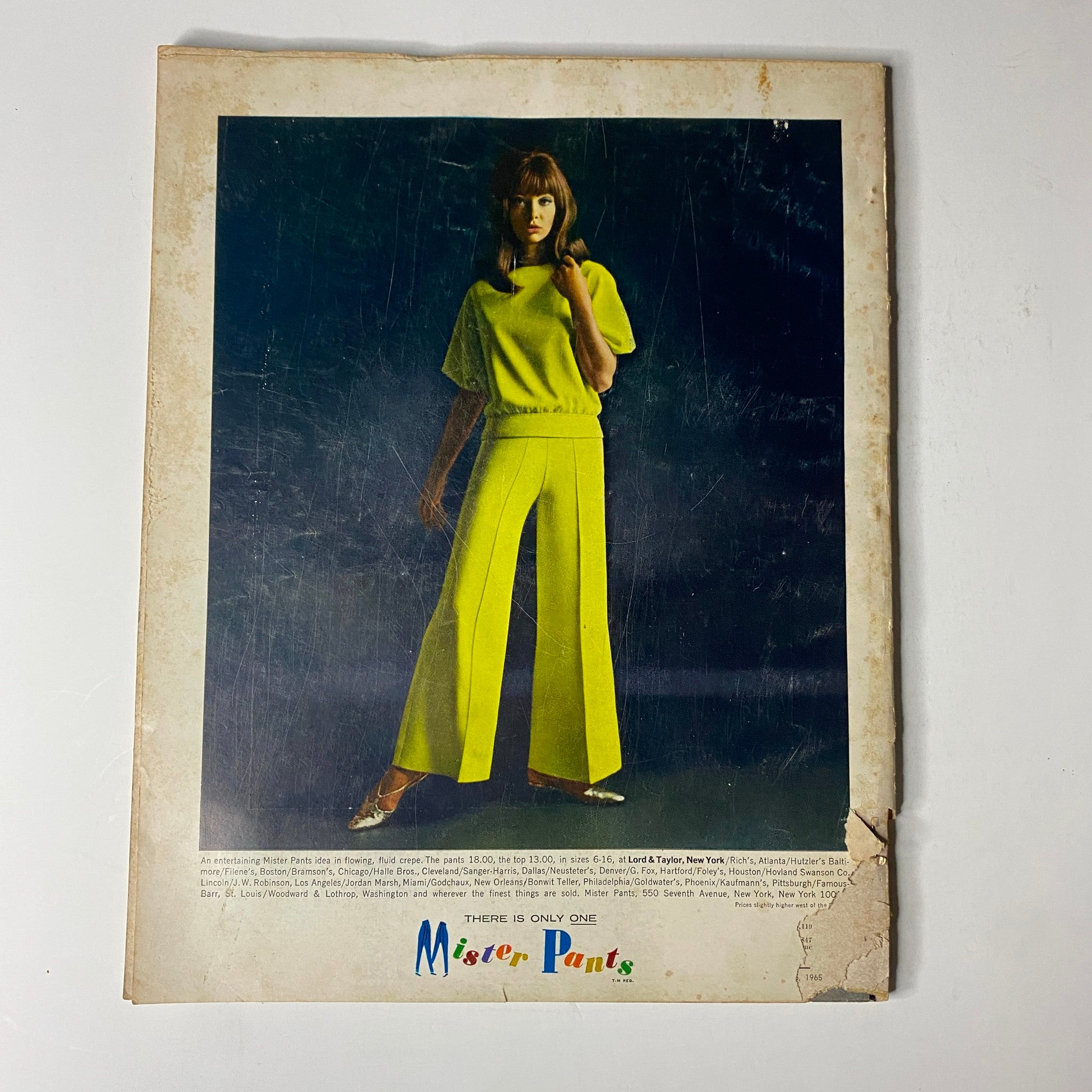 Back cover of Vogue Magazine – November 15, 1965 – displaying an ad for Mister Pants featuring a vibrant green outfit.