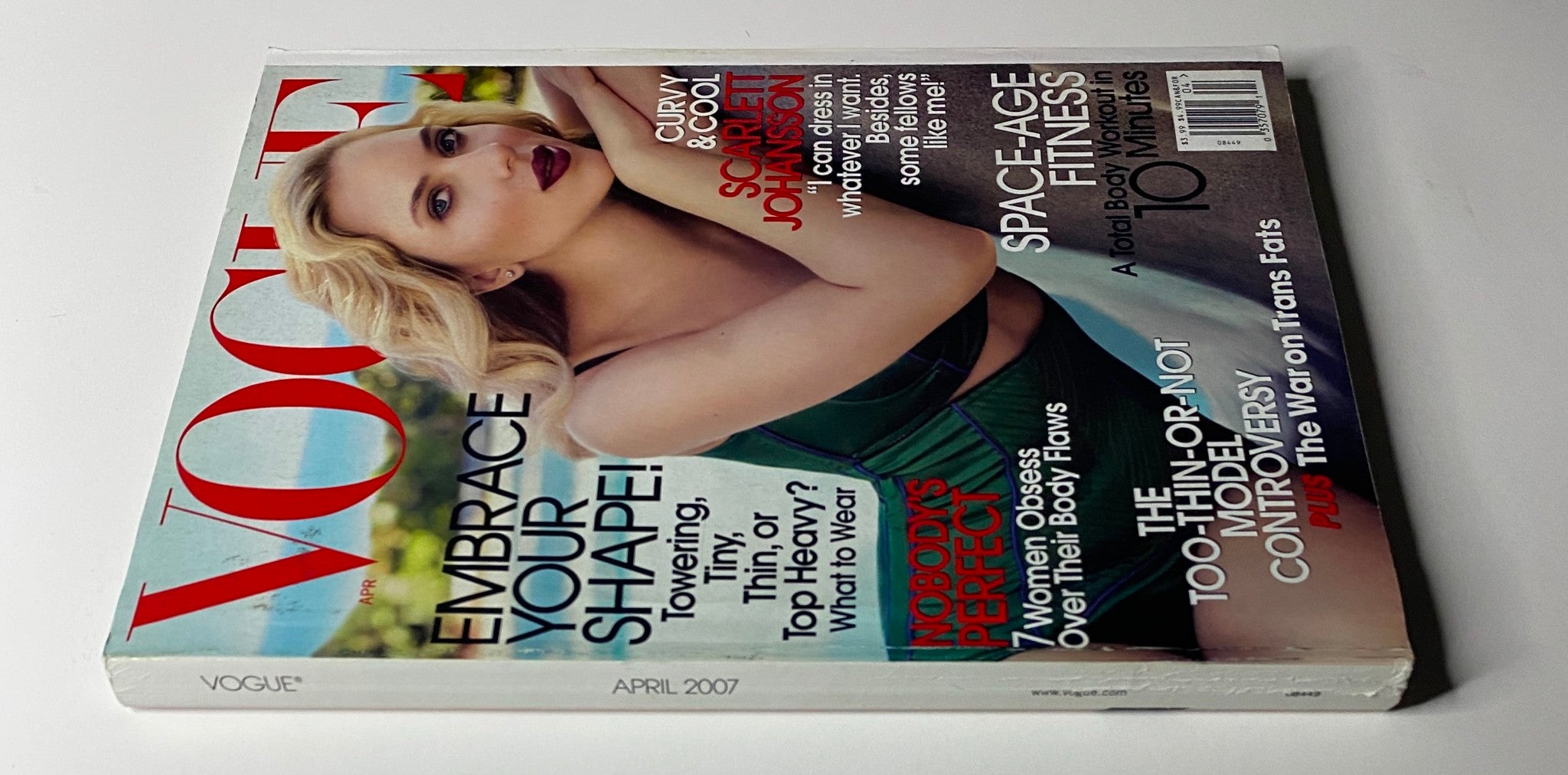 Back cover of Vogue Magazine April 2007 with Scarlett Johansson, emphasizing fitness and fashion, highlighting the magazine's focus on individuality and style.