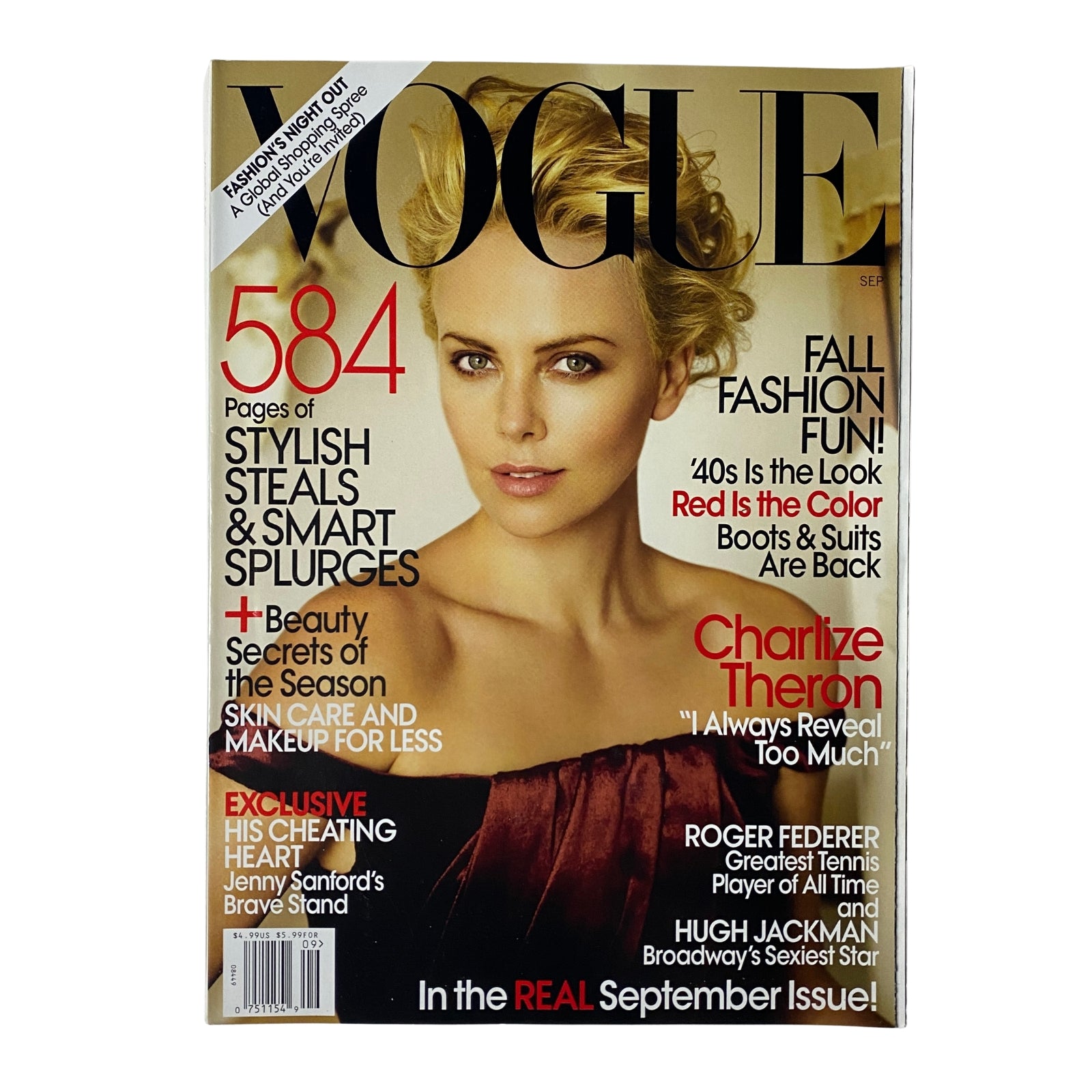 Vogue Magazine September 2009 featuring Charlize Theron on the cover in a striking Dior burgundy dress, highlighting the fall fashion theme and cultural insights from 2009.