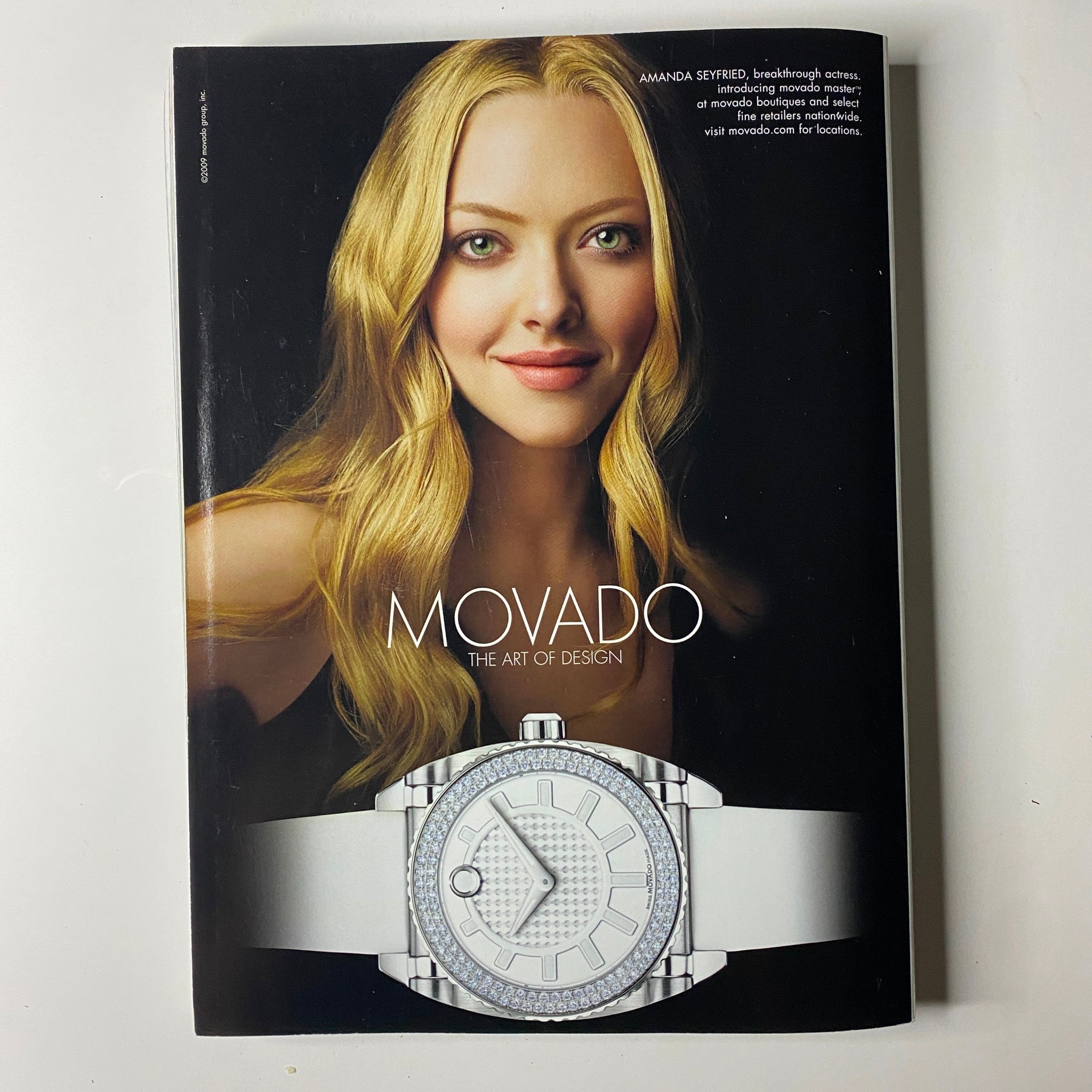 Cover of another magazine featuring actress Amanda Seyfried, highlighting fashion and design, relevant to the fashion features found in Vogue Magazine September 2009.