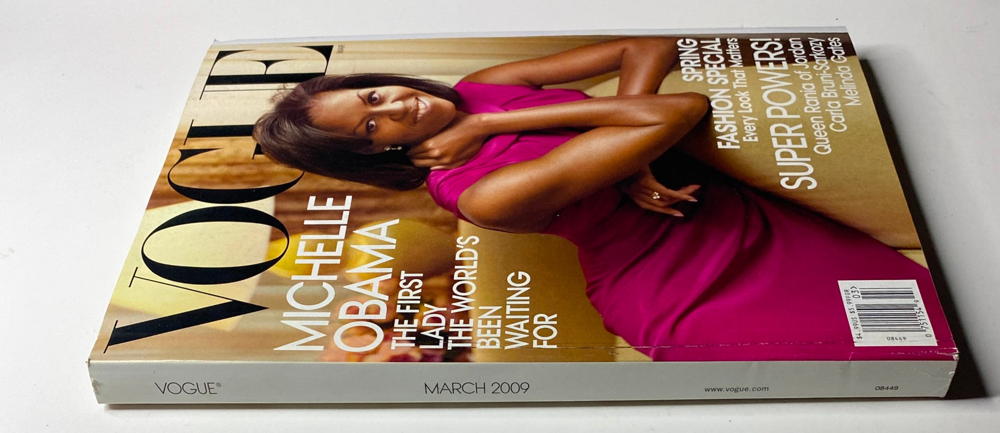 Side view of Vogue Magazine March 2009 with Michelle Obama on the cover, depicting the magazine's elegant design and notable features.