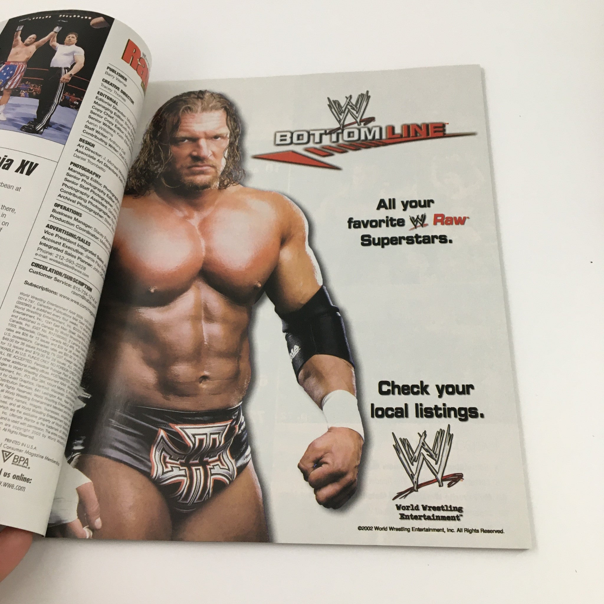 WWE Raw Magazine March 2003 featuring Triple H advertisement showcasing famous WWE Raw Superstars with the tagline 'All your favorite WWE Raw Superstars. Check your local listings.'