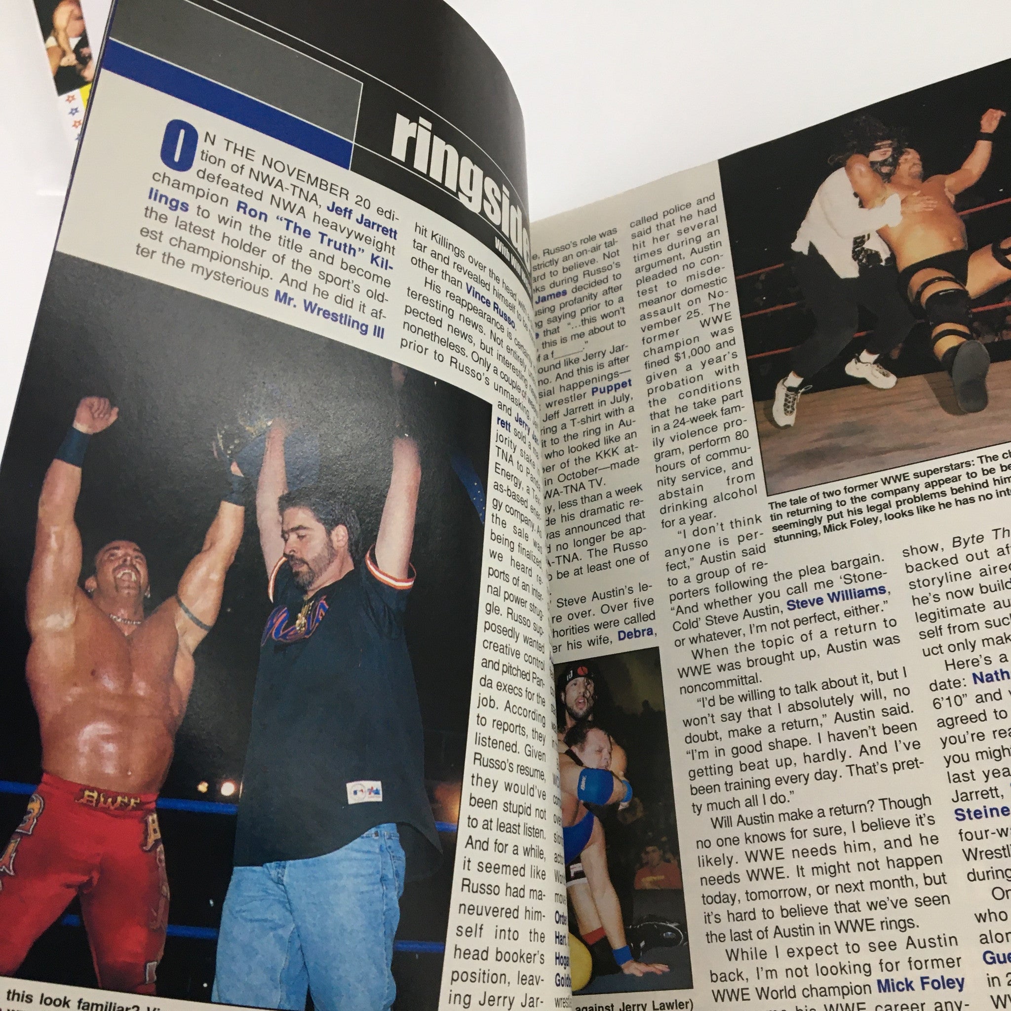 An article page from Pro Wrestling Illustrated Magazine April 2003 detailing wrestling events and featuring wrestlers celebrating victories.