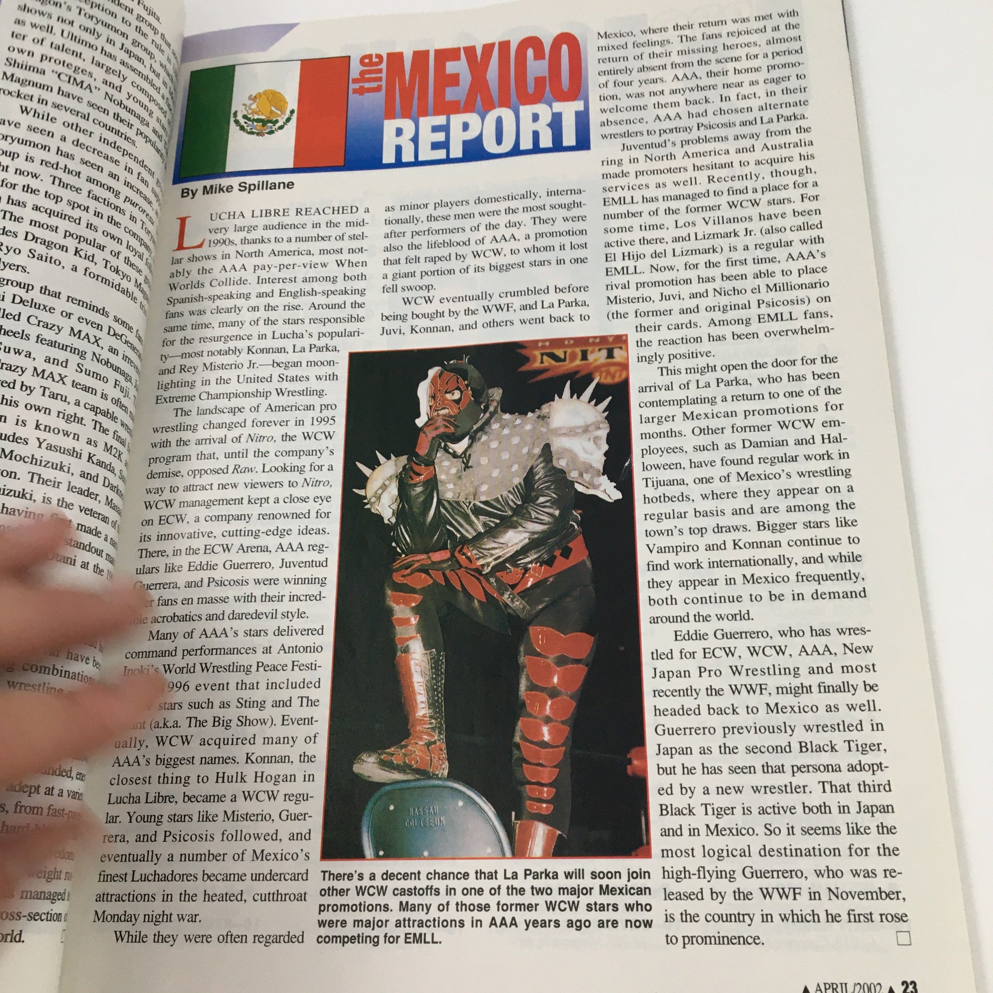 The Mexico Report article from Pro Wrestling Illustrated Magazine April 2002 showcasing a masked luchador with details on wrestling events in Mexico.
